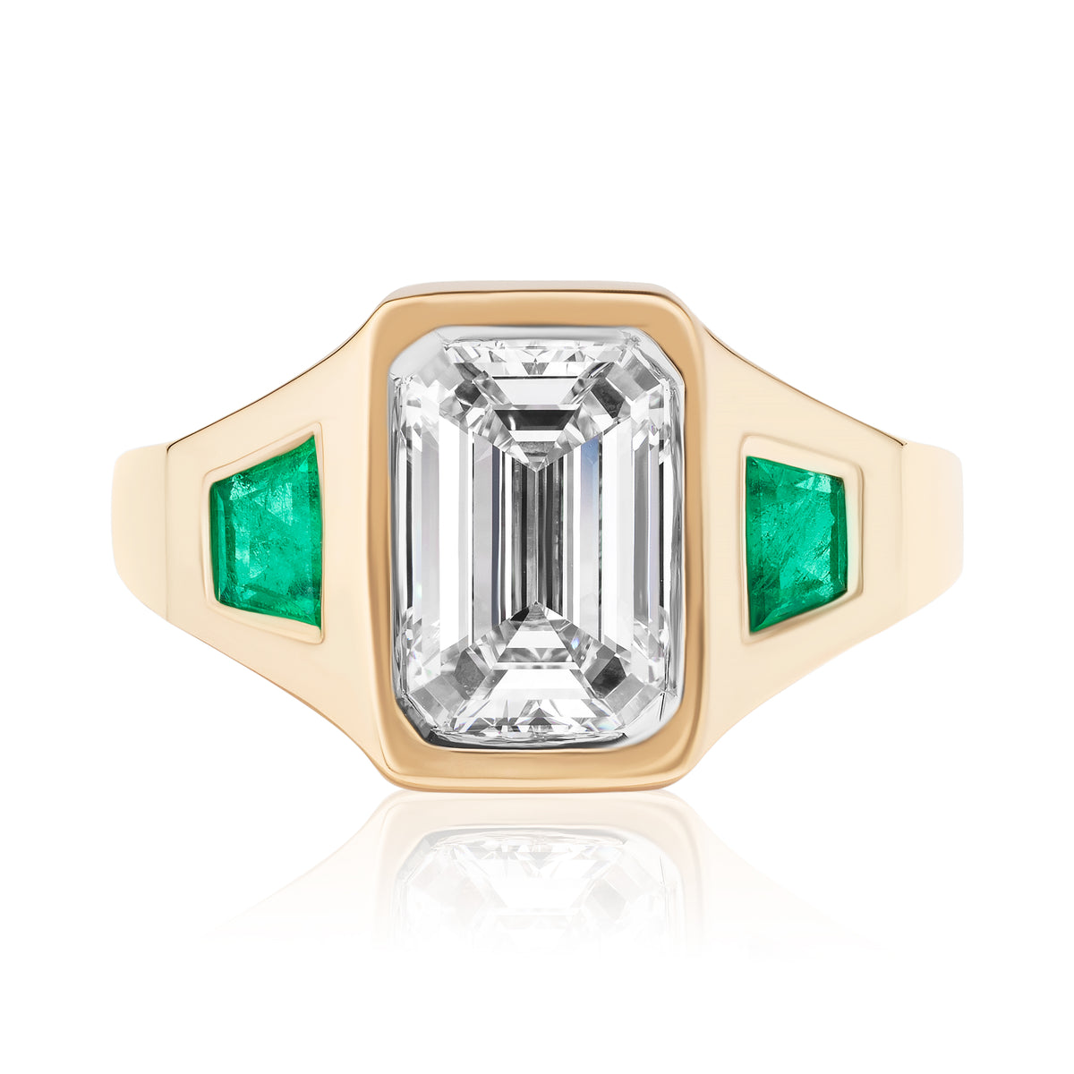 Gypsy Ring in Yellow Gold with Emerald Cut Diamond and Emerald Side Stones