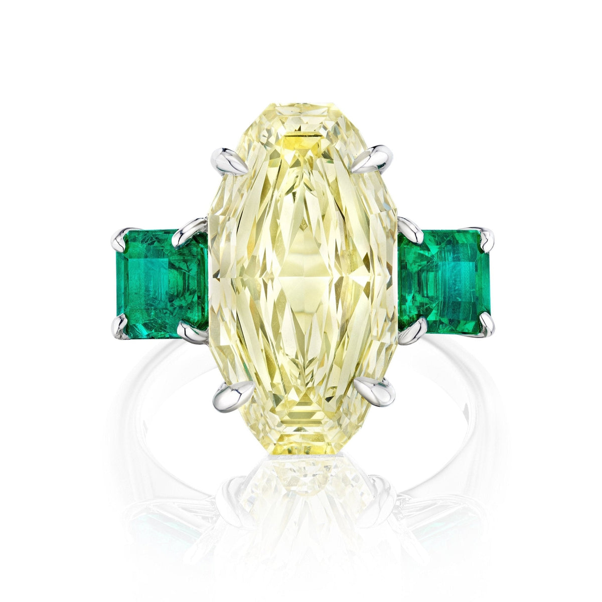 Step Cut Oval Yellow Diamond Engagement Ring with Square Emerald Side Stones in White Gold