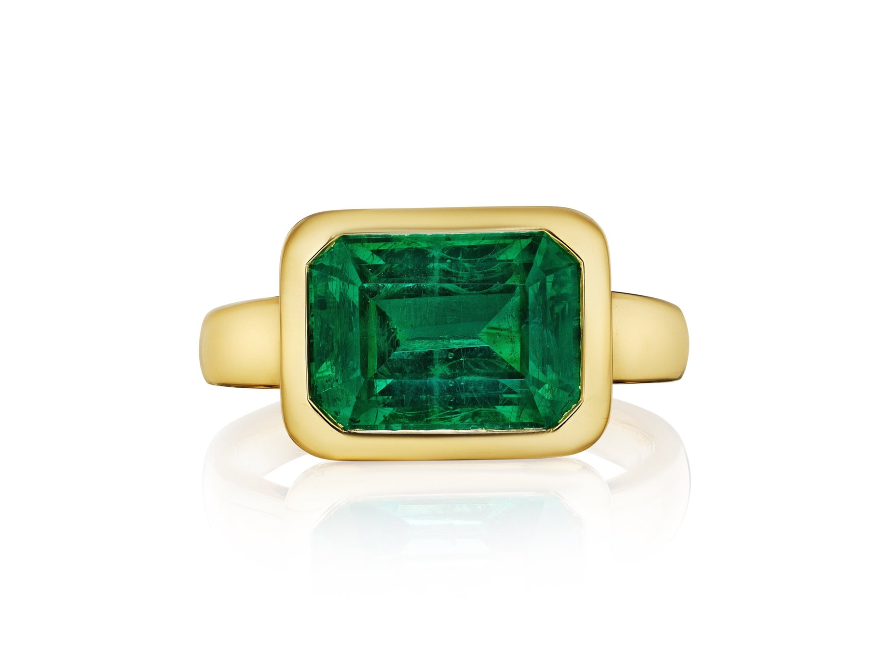 East-West Bezel Set Emerald Cut Emerald Engagement Ring in Yellow Gold