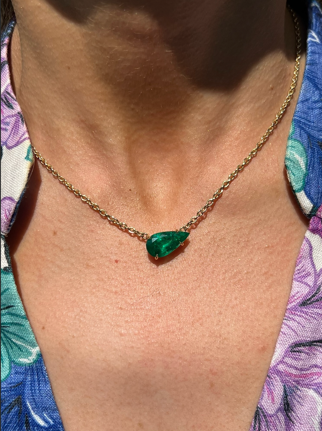East-West Pear Shape Emerald Pendant in Yellow Gold