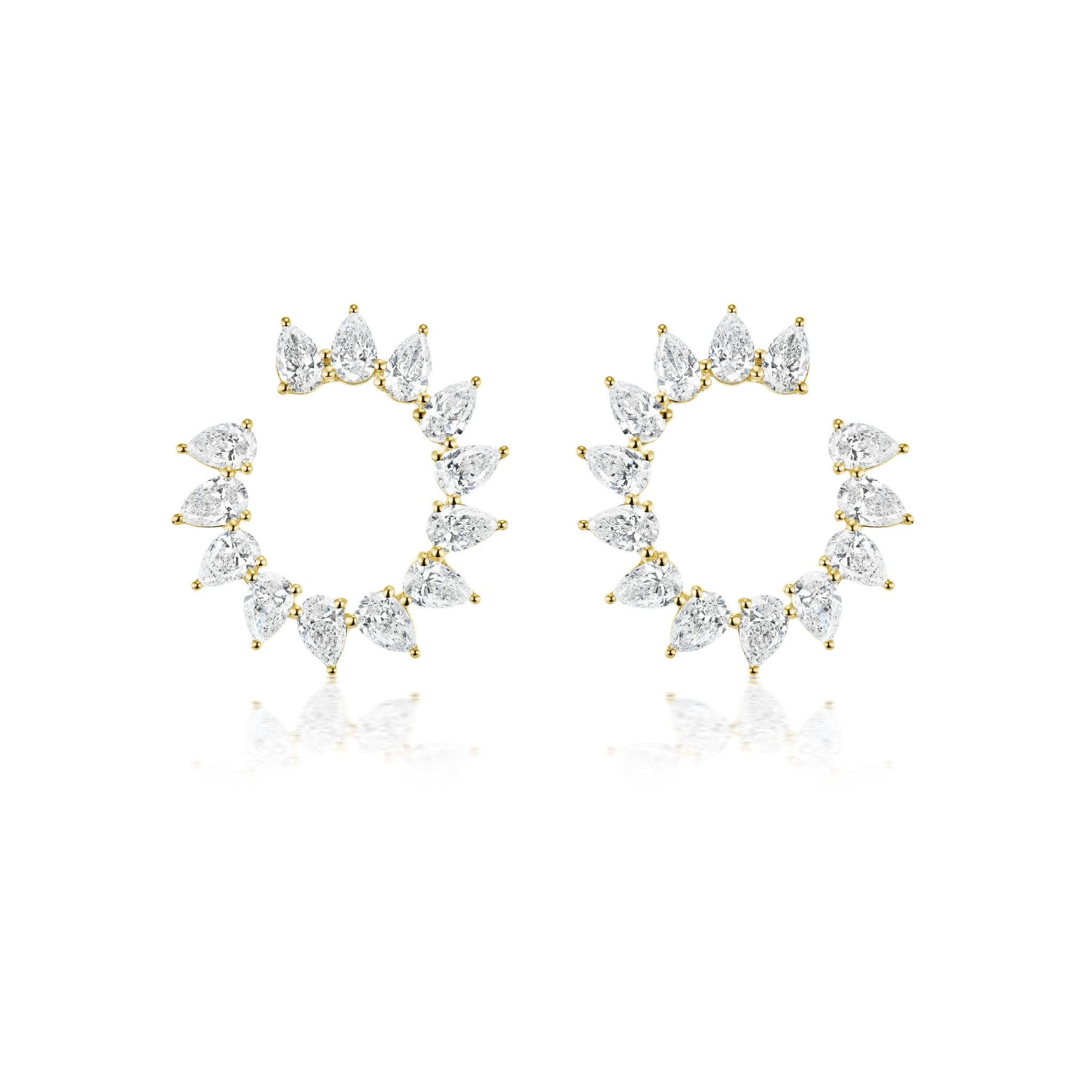 A pair of gold hoop earrings, each adorned with pear-shaped clear gemstones arranged in a circular pattern, displayed on a white background.