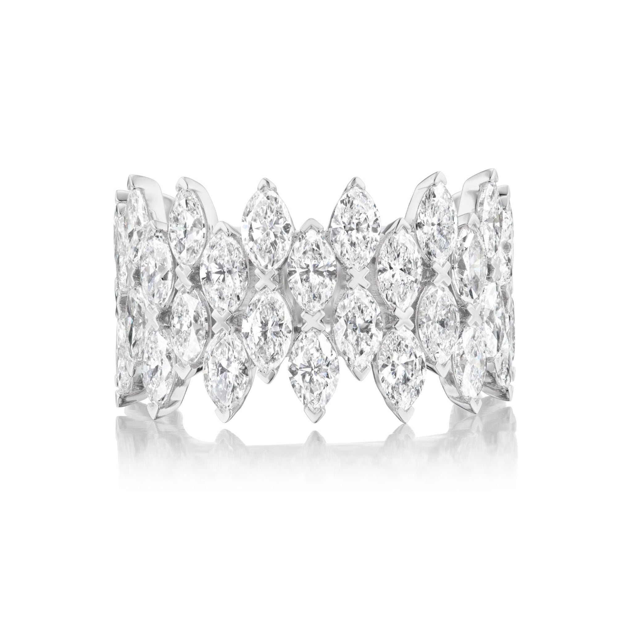 A wide white gold ring encrusted with two rows of sparkling, pear-shaped diamonds in a floral pattern, displayed on a plain white background.