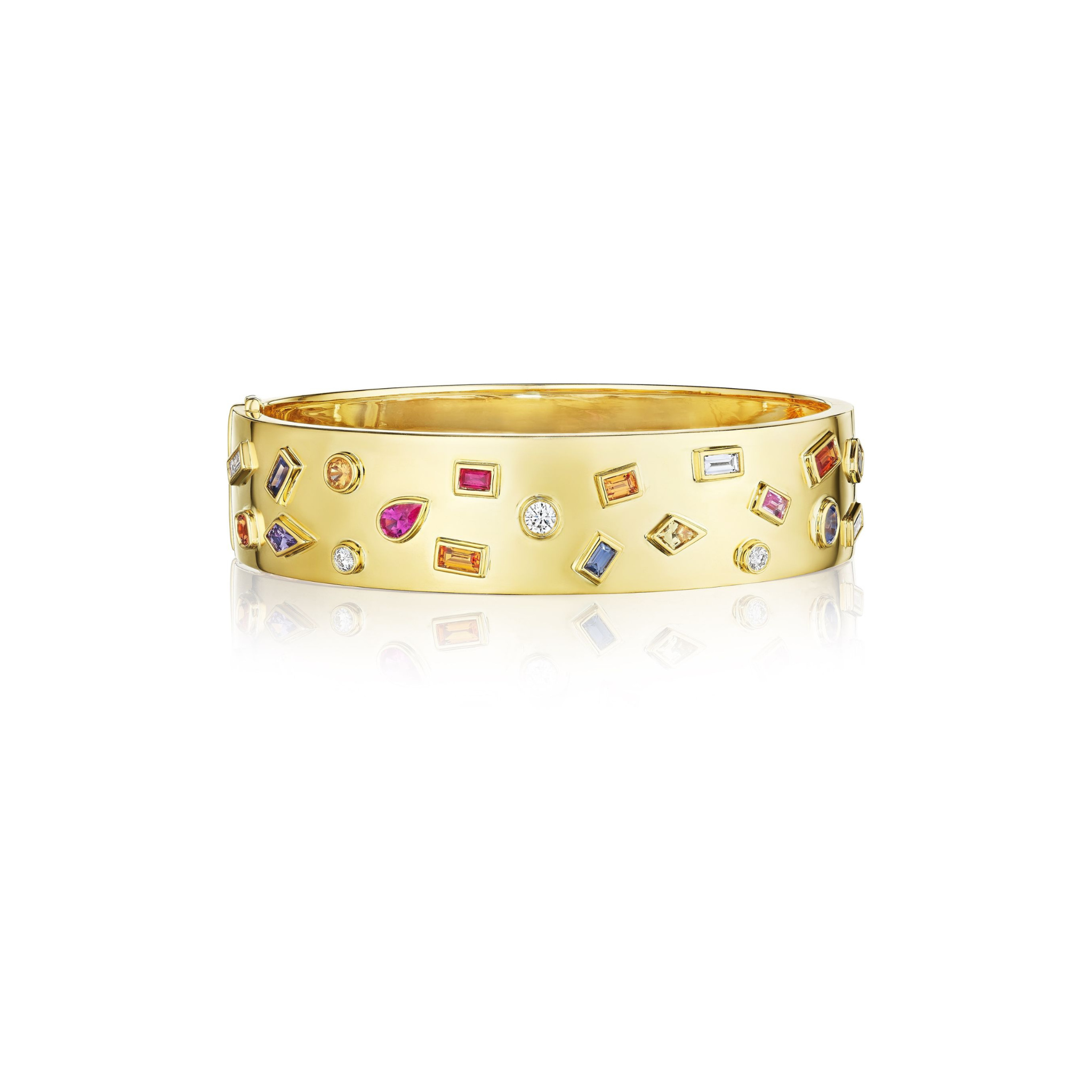 A wide gold bangle bracelet adorned with colorful gemstones of various shapes and sizes, including diamonds, sapphires, and rubies, set against a white background.