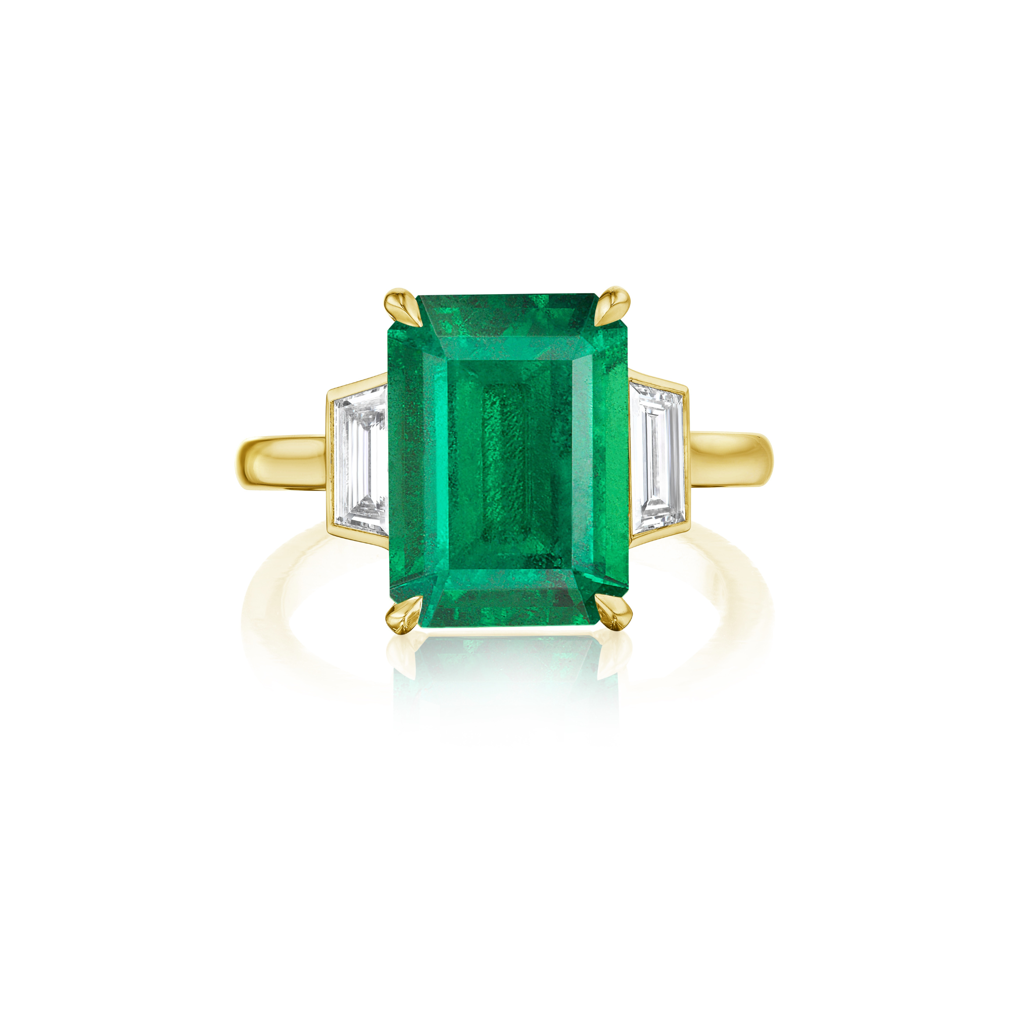 A gold ring featuring a large, rectangular emerald-cut green gemstone set in a simple bezel setting, displayed on a white background.