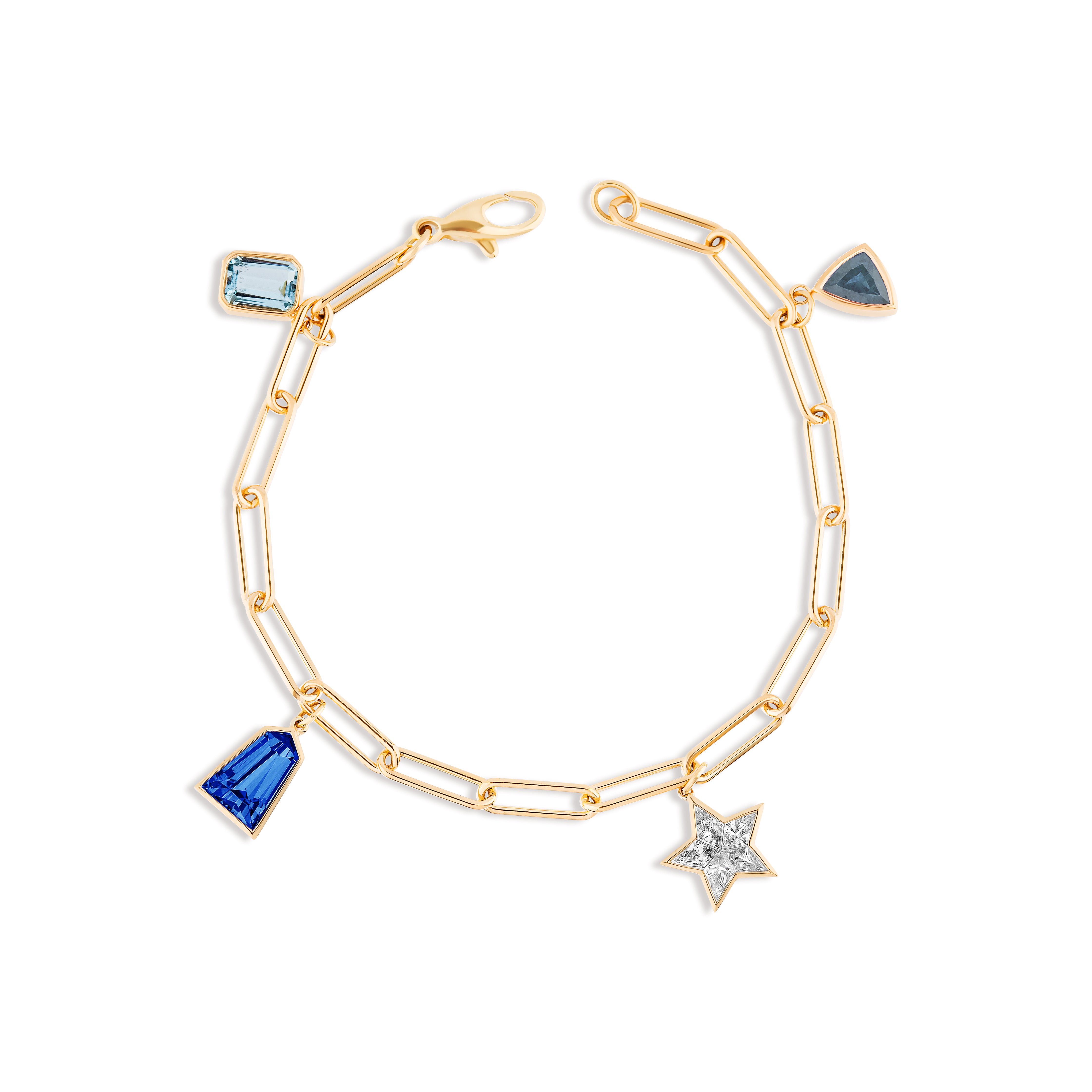 The Mixed Shape Diamond and Sapphire Charm Bracelet in Yellow Gold features a delicate 18K chain adorned with sapphire and diamond charms in various shapes, including rectangle, triangle, trapezoid, star, and a plain gold link.