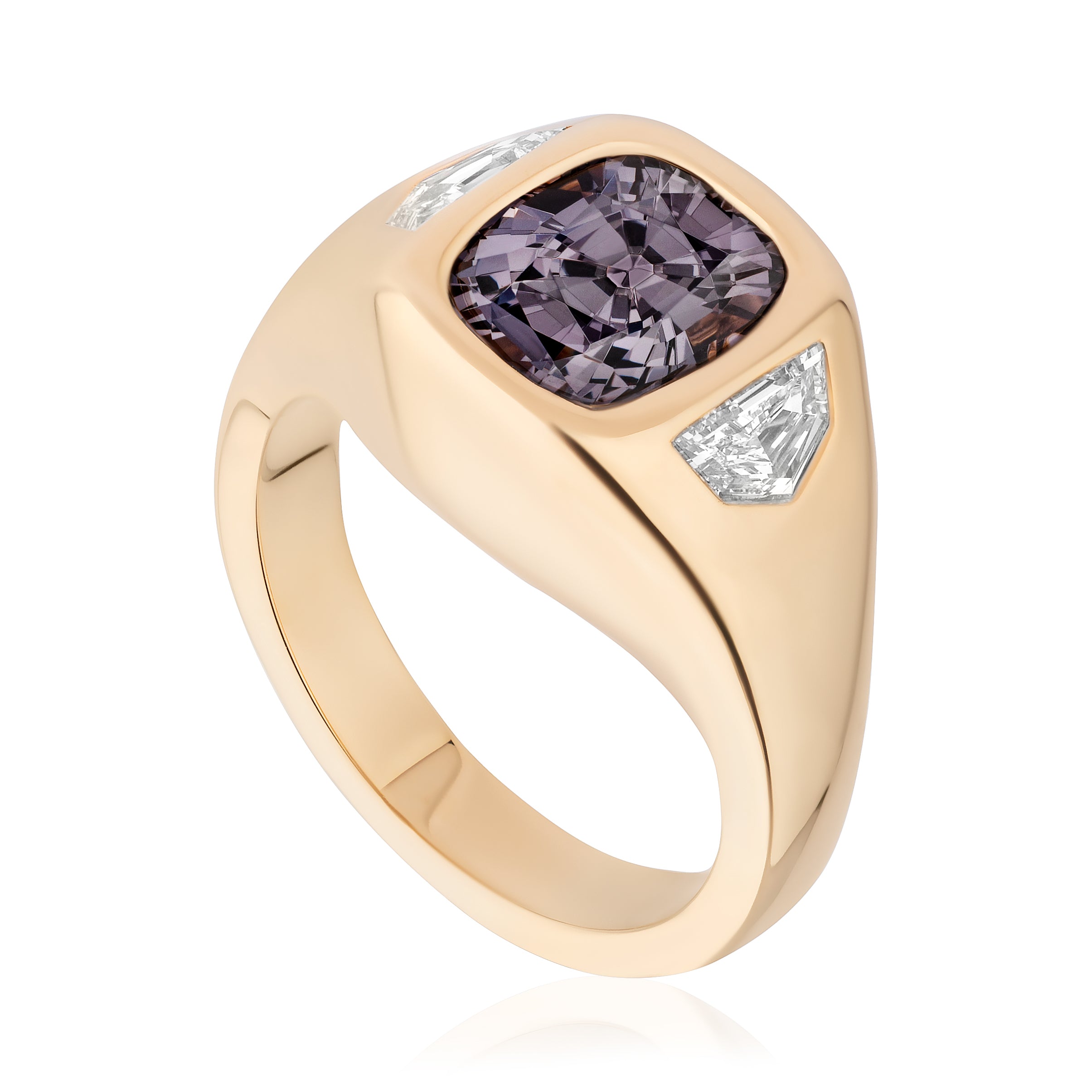 The Gypsy Ring features a cushion cut spinel centerpiece with diamond epaulette side stones, all set in 18K yellow gold.