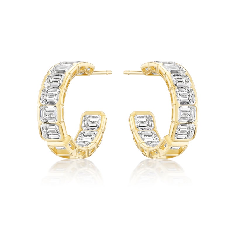 East-West Half-Bezel Set Emerald Cut Diamond Hoops in Yellow Gold, featuring 18k yellow gold and emerald-cut diamonds along the outer edge, displayed against a white background.