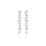 A pair of Mixed Shape Diamond Drop Earrings with kite shape stones, featuring diamonds in a vertical, alternating pattern set in white gold.