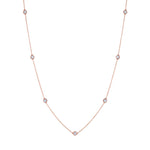 A striking Large Serpentine Station Necklace featuring hexagon bezel set diamonds elegantly spaced along the chain.