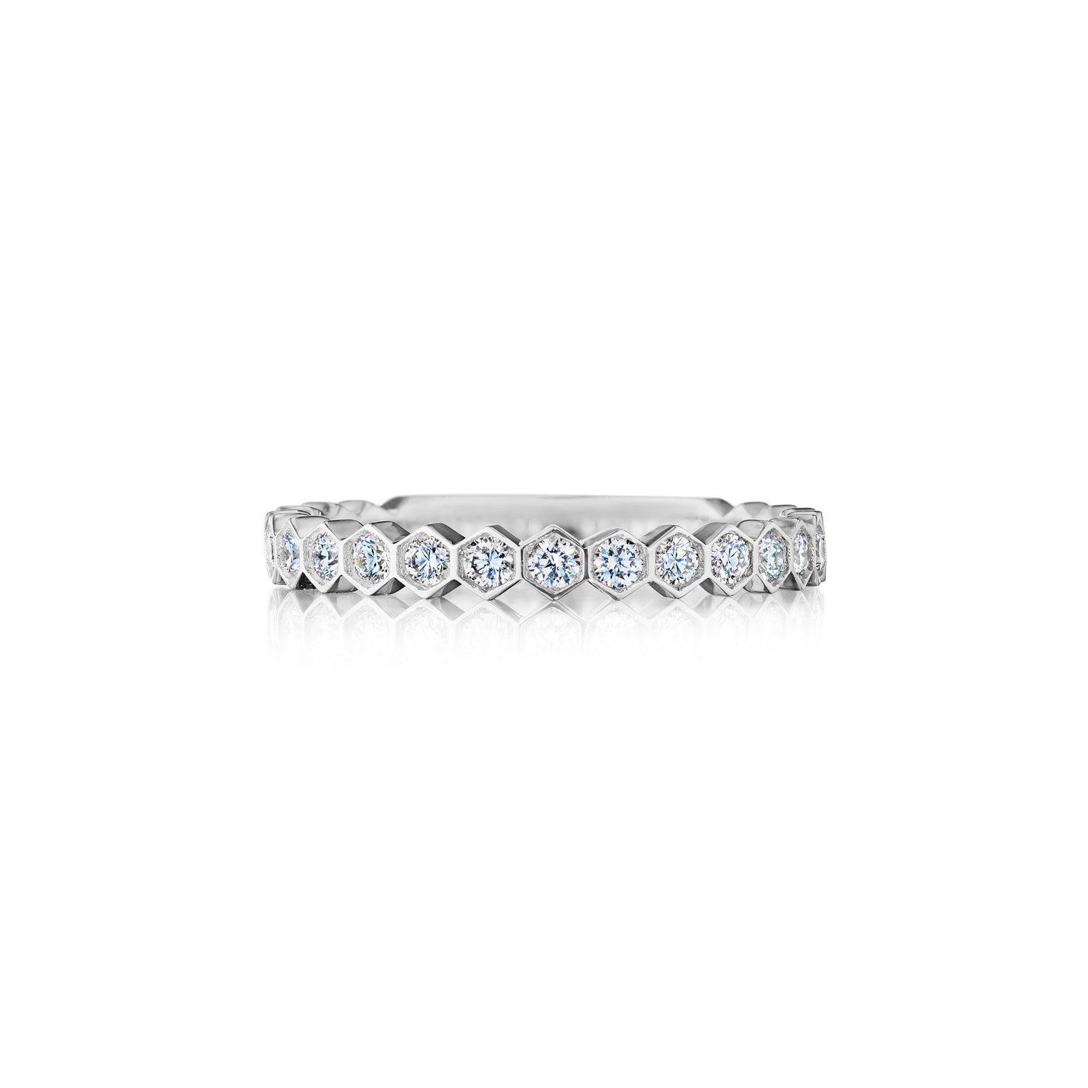 The Hexagon Bezel Set Diamond Band, crafted in silver and featuring round white diamonds, is shown on a white background.
