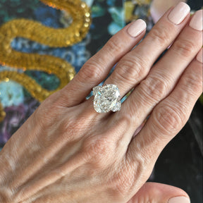 Oval Diamond Engagement Ring with Heart Shape Side Stones