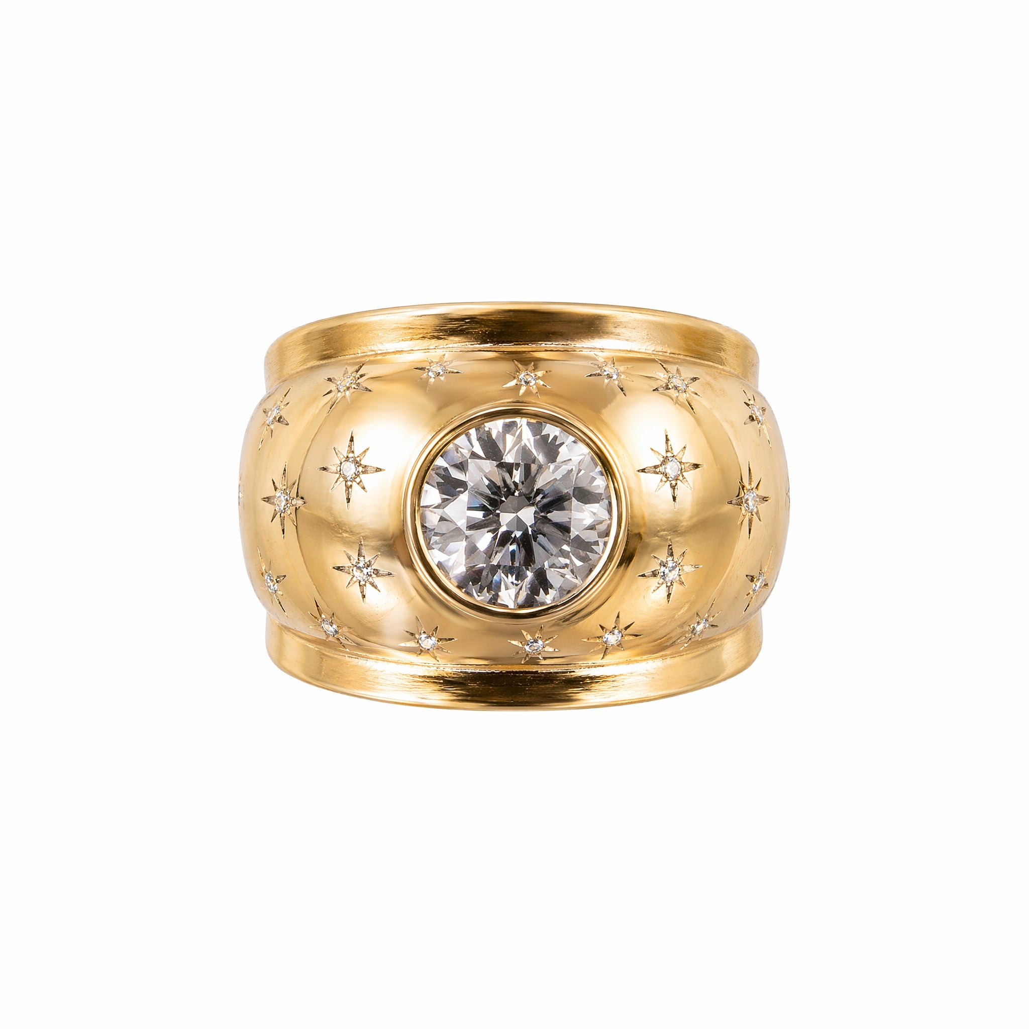 A rose gold and diamond ring, French circa 1945, features a large Old European-cut center diamond accented by engraved star motifs and smaller diamonds.