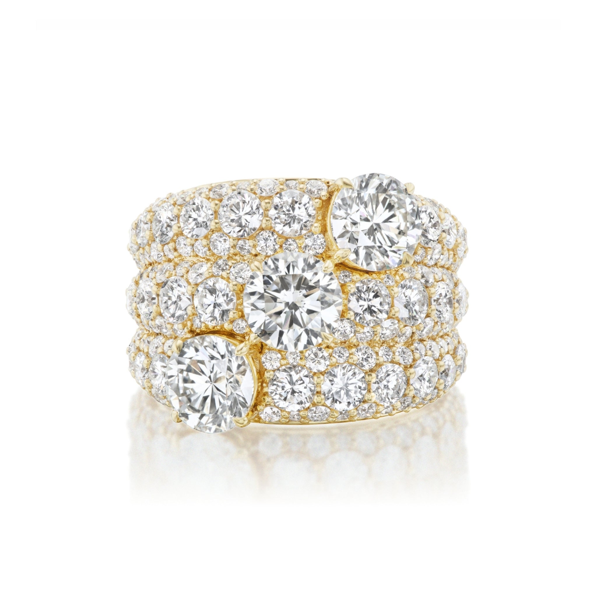 Three Stone Round Diamond Cocktail Ring in Yellow Gold featuring three rows of small round diamonds and three larger central diamonds arranged in a staggered pattern, displayed against a white background.