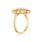 Bezel Set Round Brilliant Diamond and Sapphire Multi Color Ring in Yellow Gold, featuring a slender yellow gold band with a vibrant cluster of bezel-set round brilliant diamonds and sapphires arranged in a floral-inspired design, shown from the side against a white background.