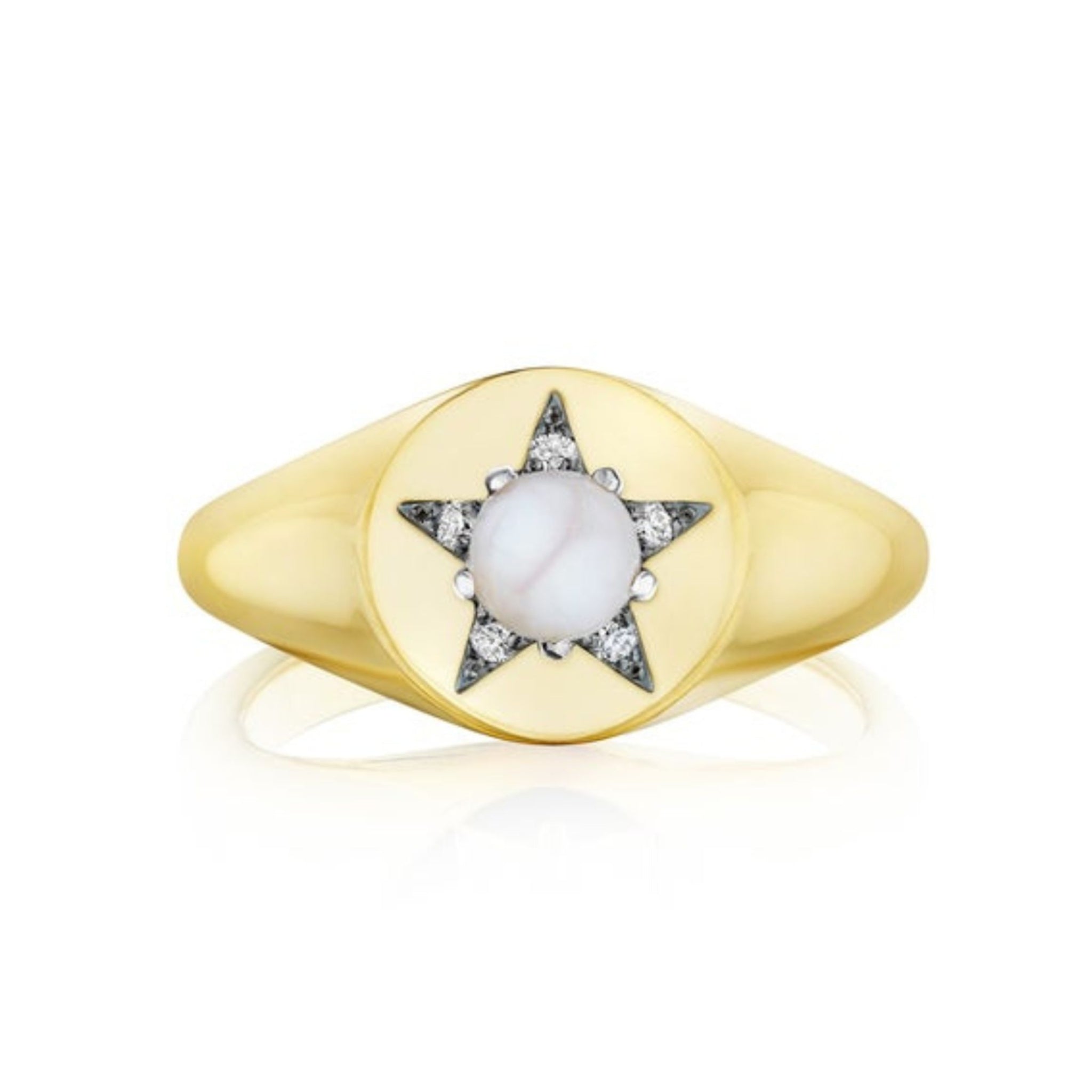 America250 Star Signet Ring in Yellow Gold and Platinum, handcrafted in New York City, showcases a round white stone set at the center of a star motif, accented with small clear stones on a smooth, polished band—a standout piece from the America250 capsule collection.