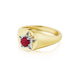 Introducing the America250 Star Signet Ring in Yellow Gold and Platinum: meticulously handcrafted in New York City, this exquisite piece features a central red gemstone set within a striking star-shaped design and accented with small white details. Part of the America250 capsule collection, it is beautifully crafted from 18k yellow gold enhanced with platinum.