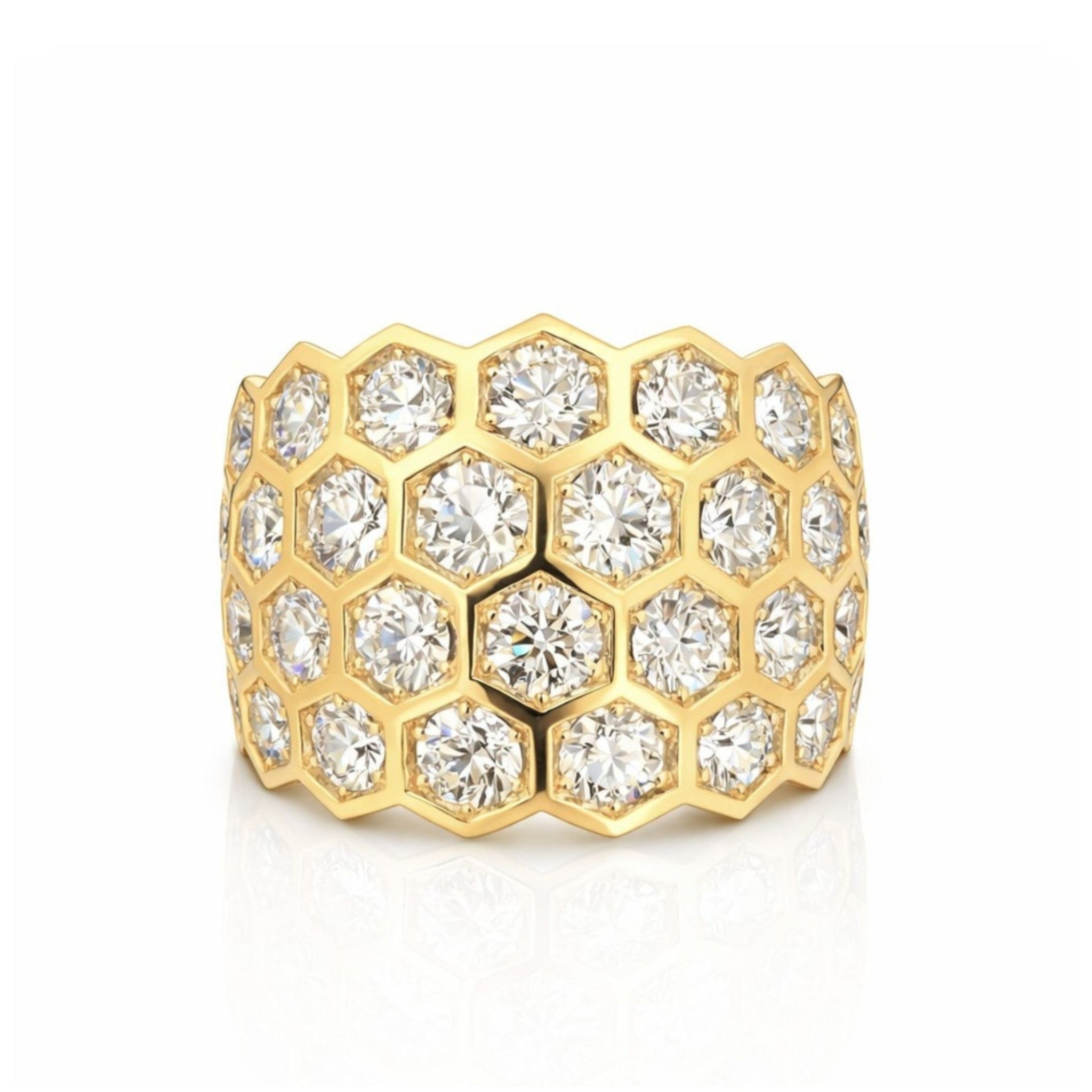 The Hexagon Bezel Set Multi-Tier Chunky Band with Round Diamonds in Yellow Gold showcases a bold honeycomb motif, with each hexagon bezel-set with a brilliant round diamond, all presented against a white background.