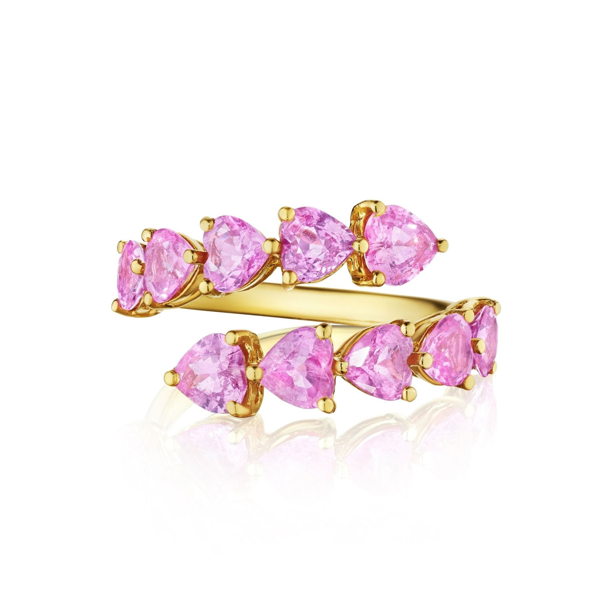 The Chasing Hearts Wraparound Ring with Pink Sapphire Hearts in Yellow Gold showcases double rows of heart-shaped pink sapphire gemstones set in 18k yellow gold, arranged in an overlapping pattern and displayed against a white background.