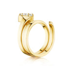 Introducing the Pear Shape Diamond Snake Wraparound Ring in Yellow Gold—a modern 18k yellow gold ring with a spiral band design, featuring a single pear-shaped diamond in a minimalist prong setting. Beautifully displayed on a white background, this sophisticated piece is an elegant example of diamond jewelry.