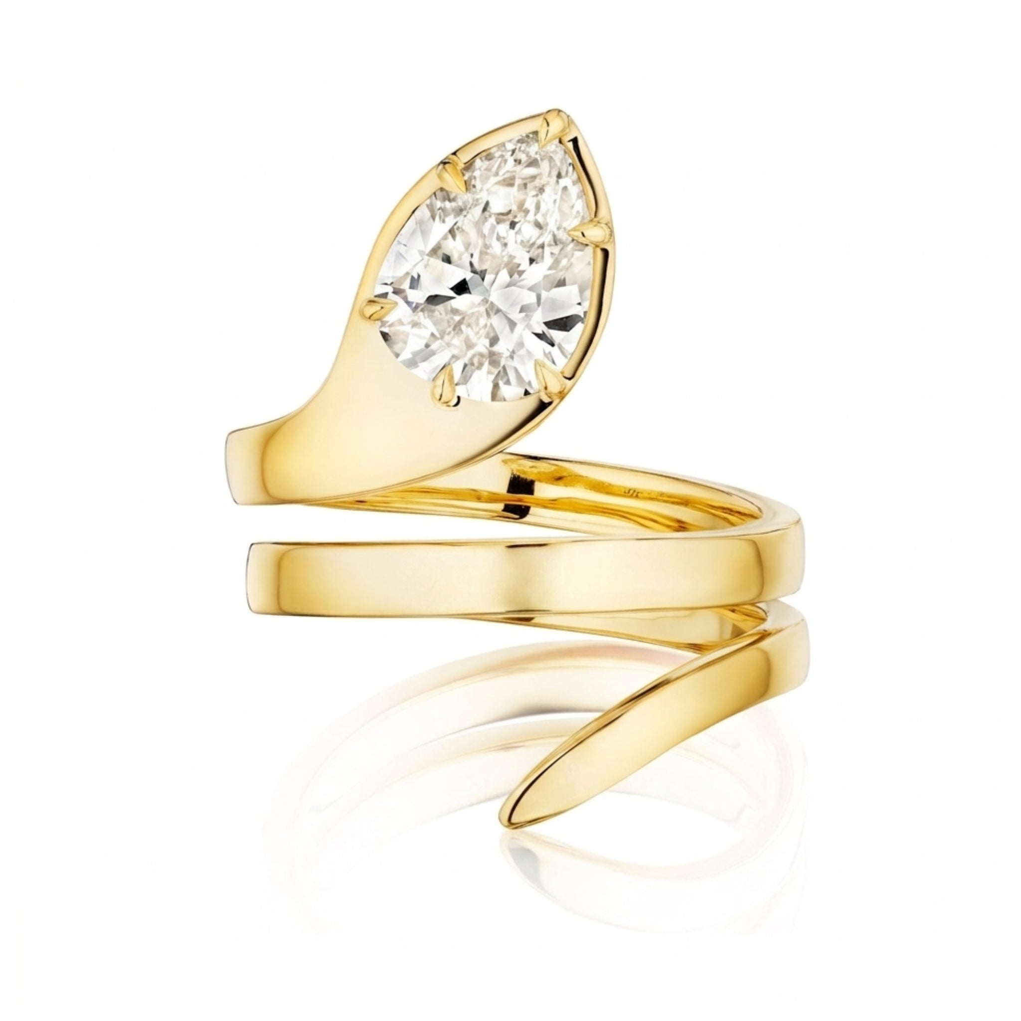 Introducing the Pear Shape Diamond Snake Wraparound Ring in Yellow Gold: a striking 18k gold ring showcasing an elegant snake-inspired wraparound design, highlighted by a large pear-shaped diamond set asymmetrically at the top—an exceptional choice for those who embrace bold and distinctive elegance.