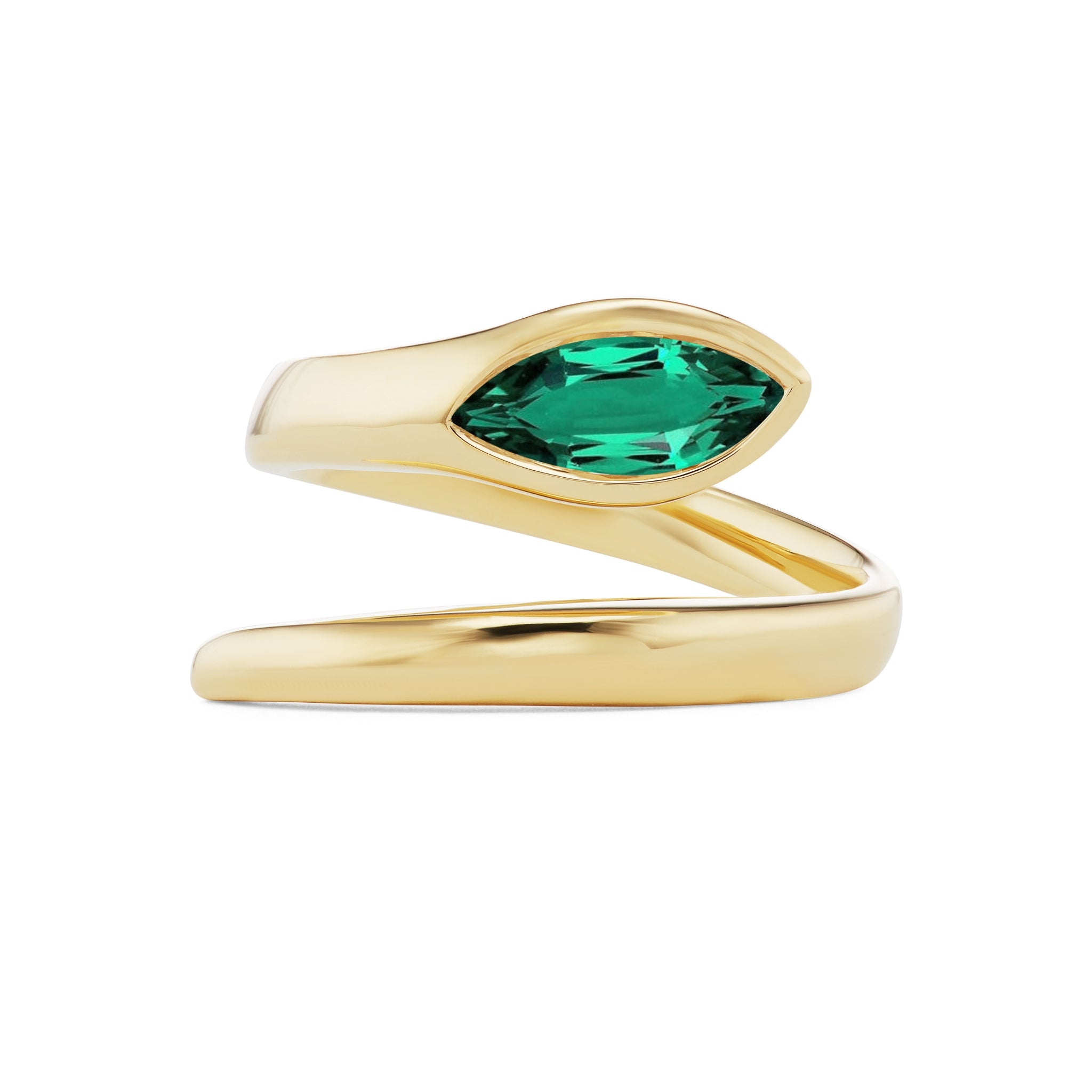 The Wraparound Snake Ring with Marquise Emerald in Yellow Gold is an open band ring crafted in 18k yellow gold, featuring a striking marquise emerald gemstone set gracefully at its center.