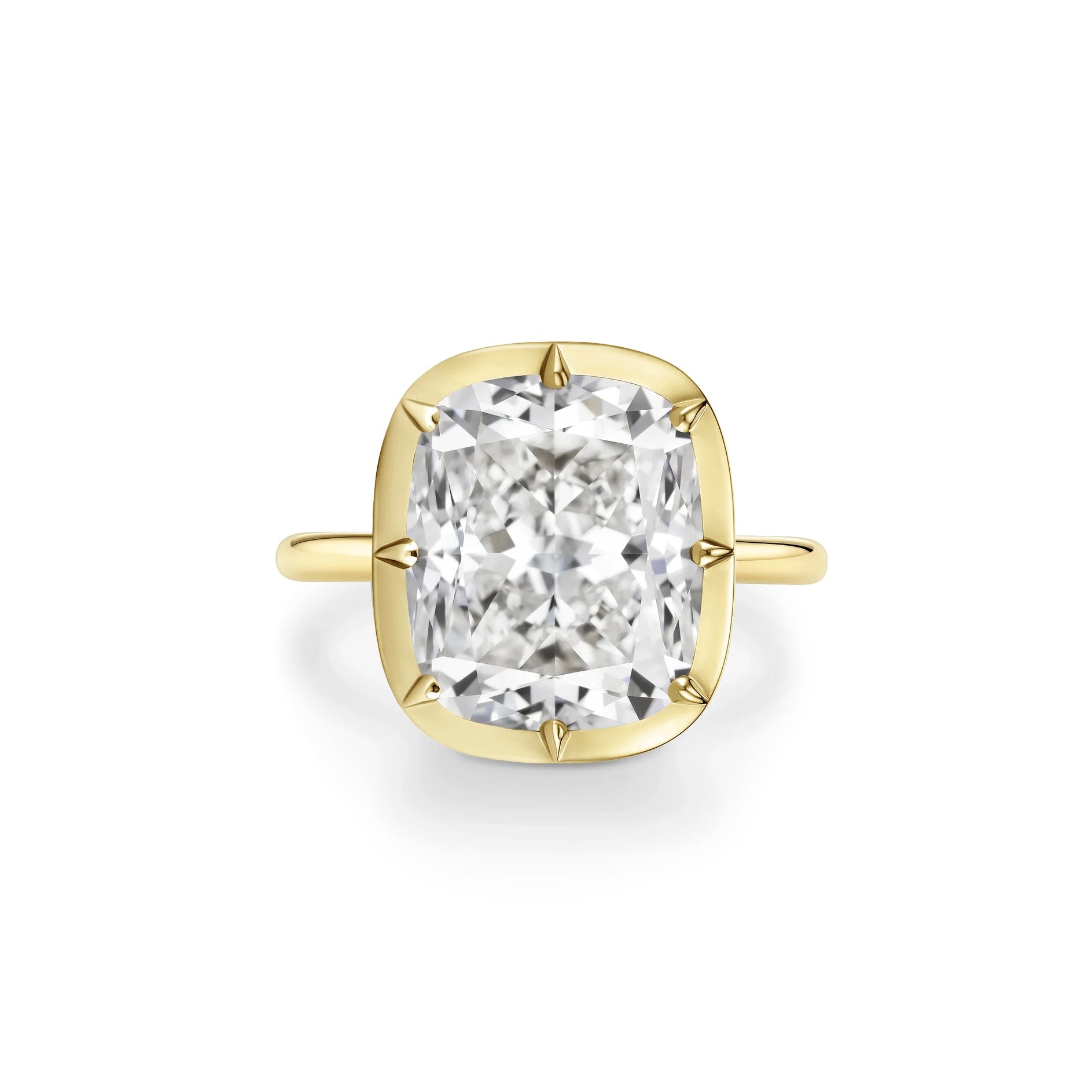 The Collet Set Cushion Cut Diamond Engagement Ring in 18k Yellow Gold features a large cushion cut diamond on a simple yellow gold band, shown against a white background.