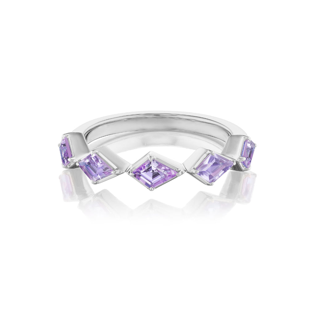 The Chasing Kites Purple Sapphire Half Eternity Band in Rhodium showcases five square-cut lavender stones in a zigzag pattern, set on a silver band and displayed atop a white background with a subtle reflection below.