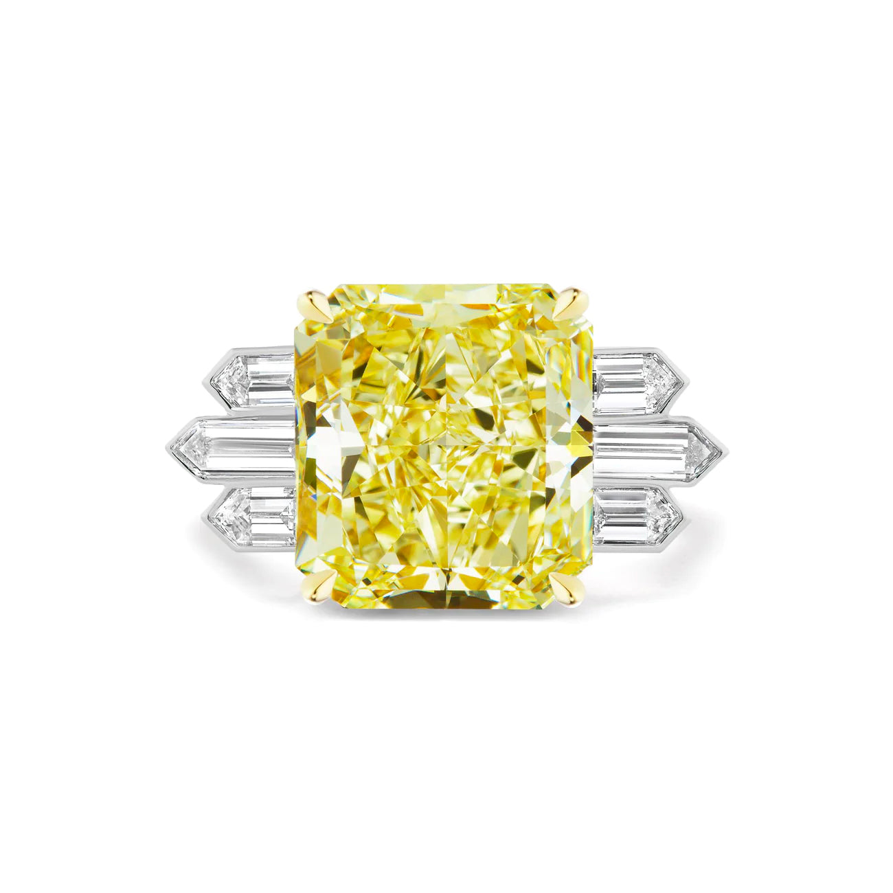 The Art Deco Engagement Ring features a fancy yellow radiant cut diamond and bullet baguette side stones—an eye-catching and unique choice for your celebration.