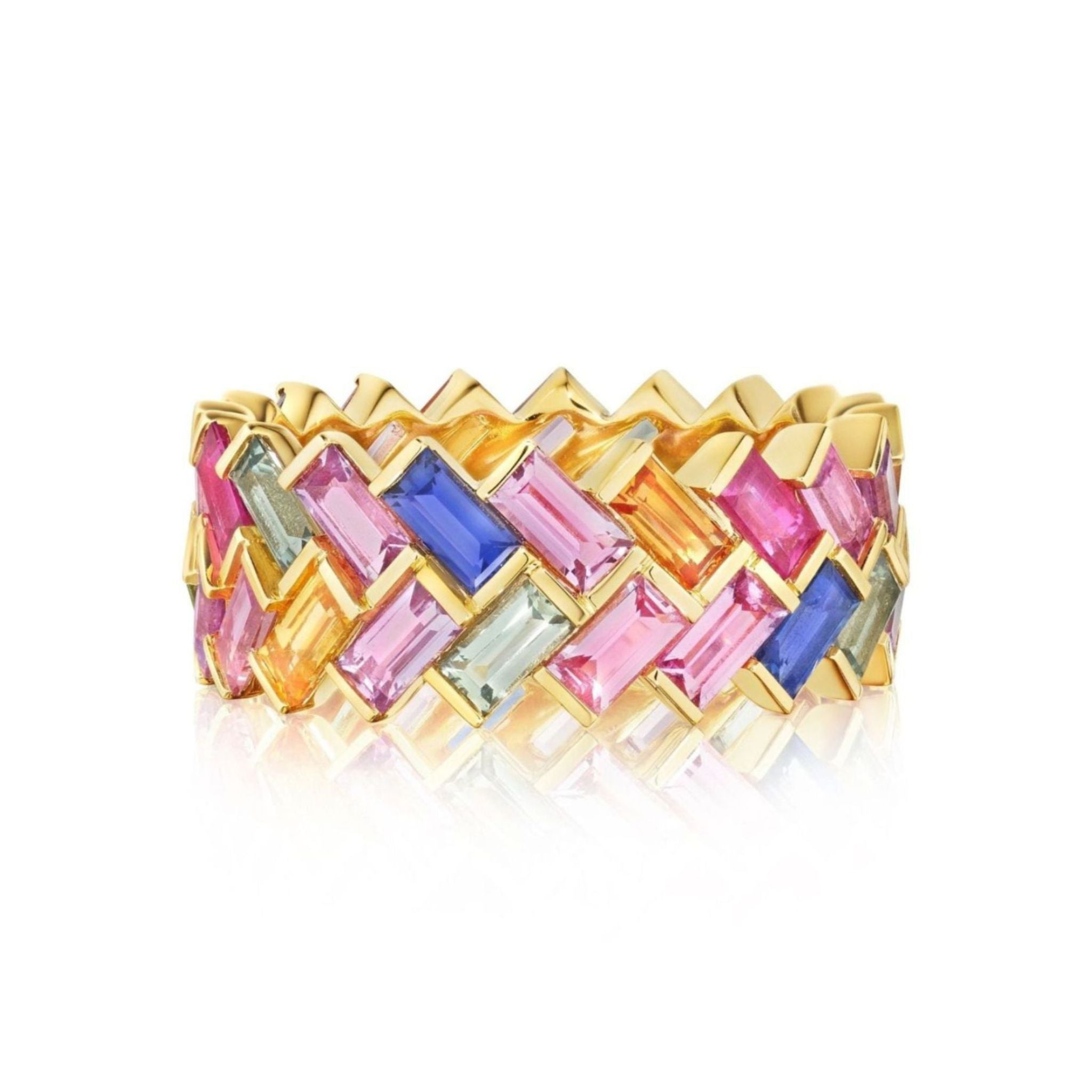 Make a maximalist statement with the Chroma Chevron Bezel Set Ring, crafted in 18k yellow gold and showcasing a vibrant woven chevron pattern of multicolor baguette sapphires—including pink, orange, blue, light green, and yellow—set against a bold white background.