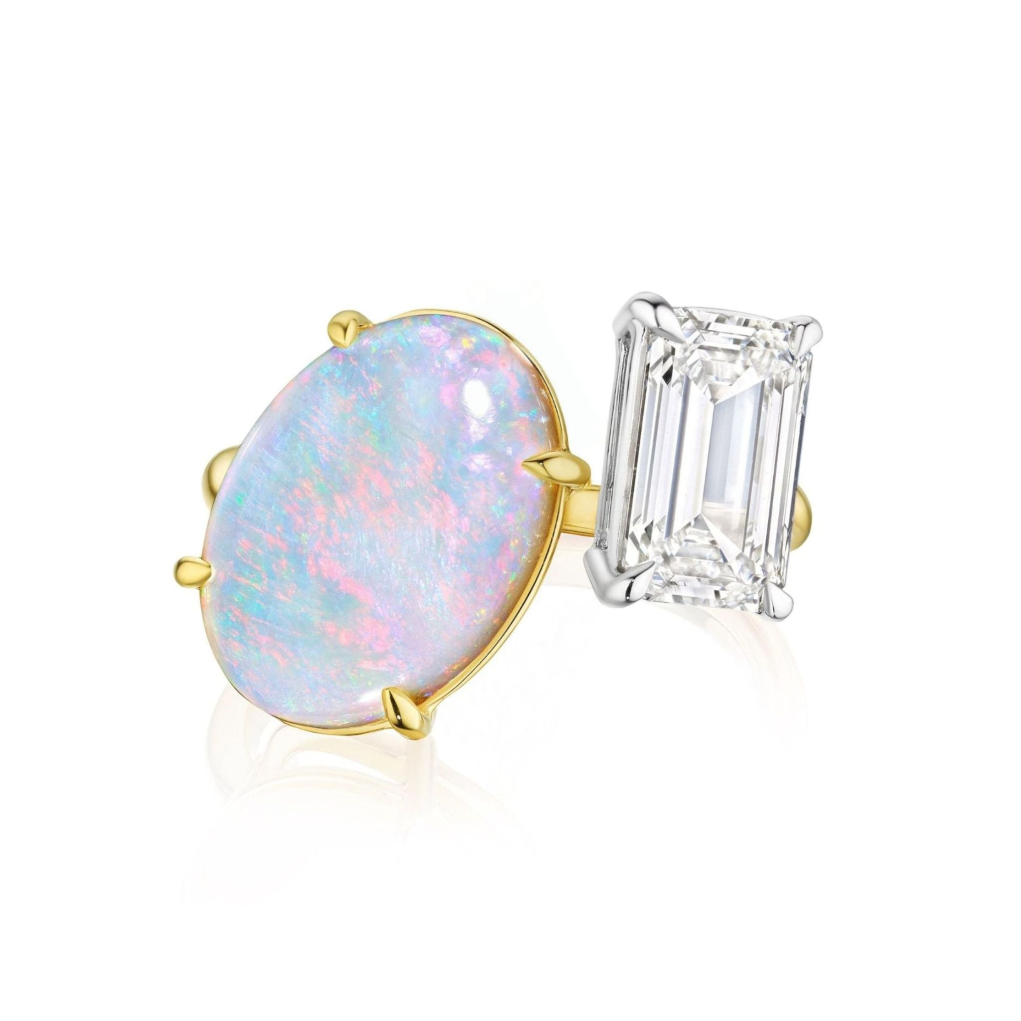 The Toi et Moi Opal and Diamond Ring in Yellow Gold features a large oval opal set in 18k yellow gold alongside an emerald-cut diamond set in white gold, both elegantly sharing an open band.