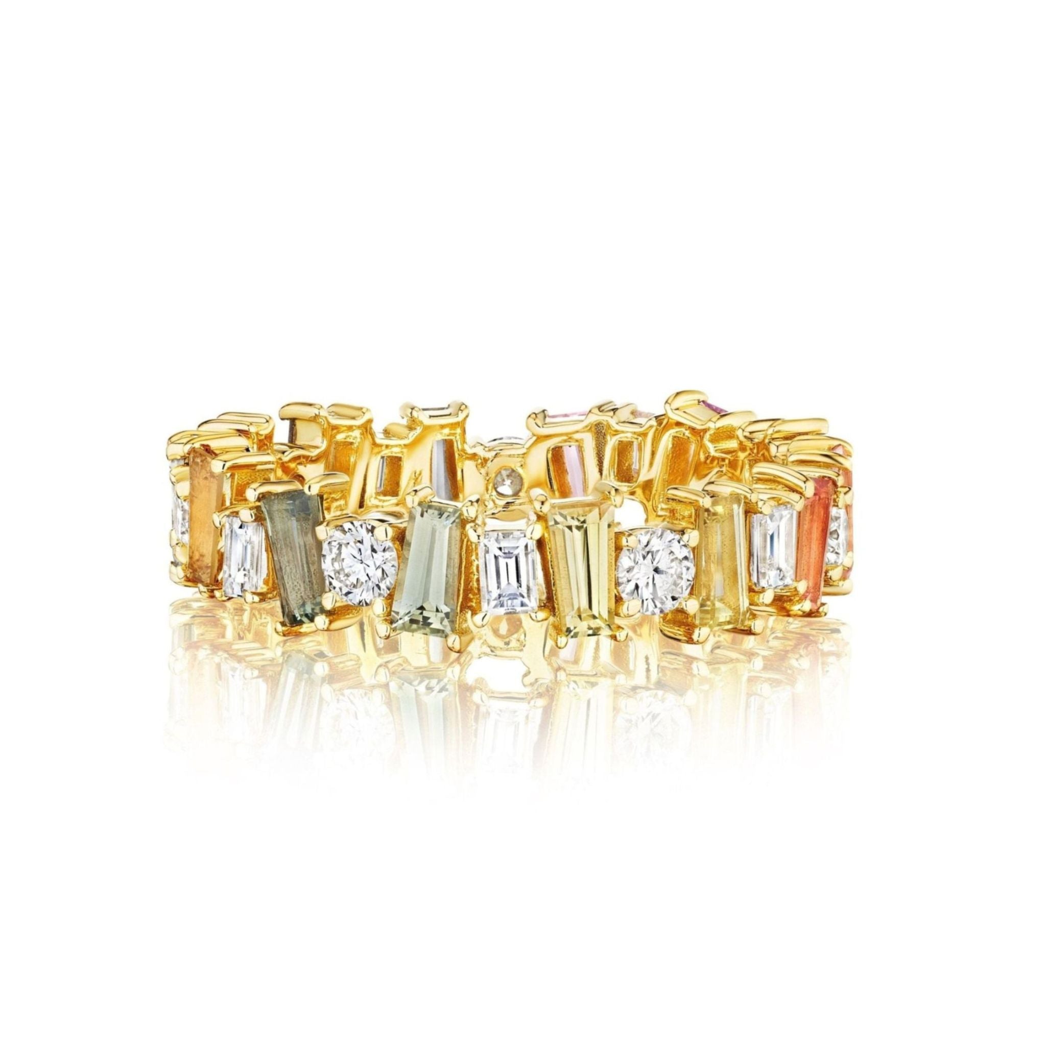 The Multicolor Eternity Band in Yellow Gold showcases alternating rectangular Tapered Baguette Sapphires and Round Diamonds in clear, green, and pink hues, arranged in a repeating pattern around the 18k yellow gold band.