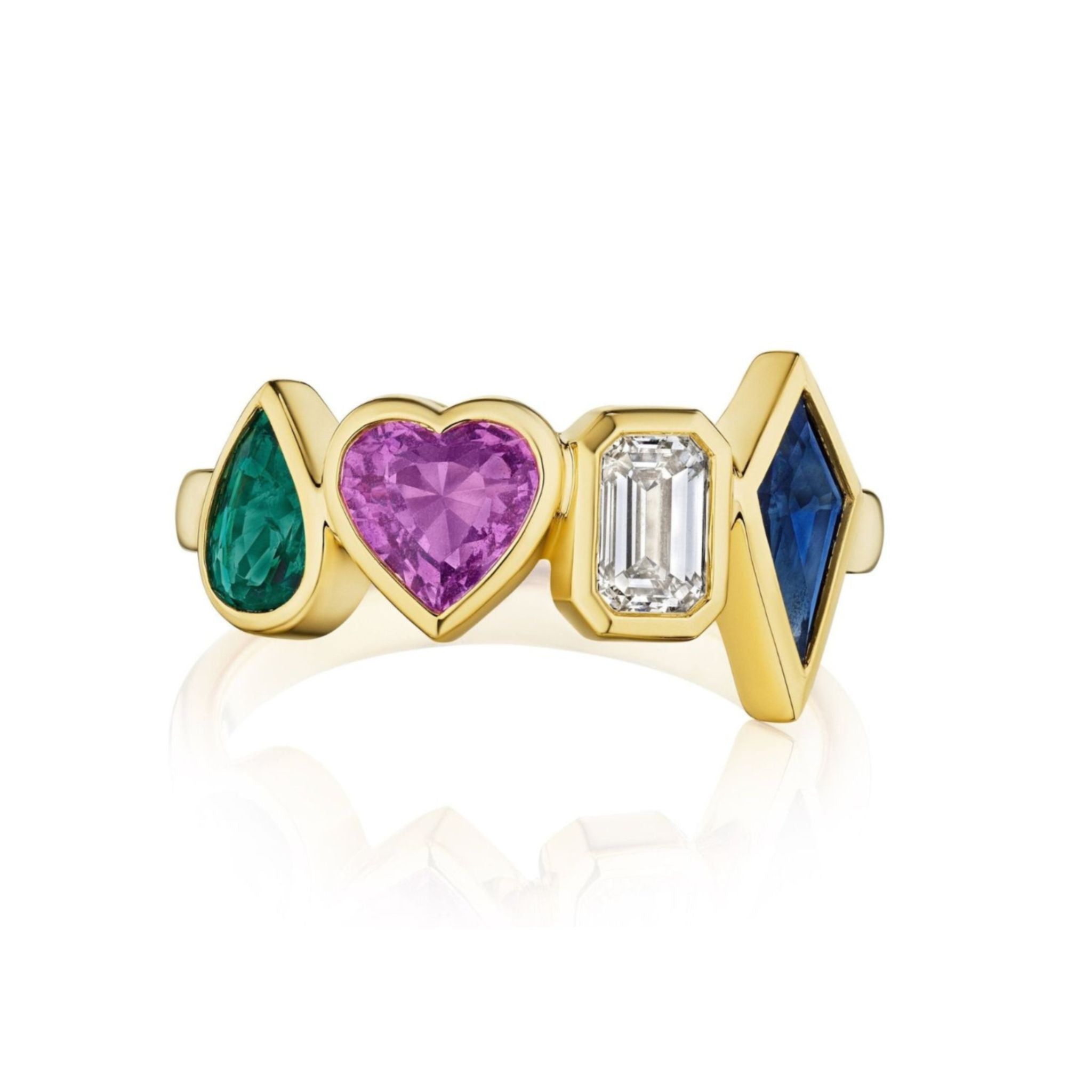 The Chroma Heart Beats Bezel Set Cluster Ring in yellow gold showcases a vibrant mix of shapes and gemstones—including an emerald, diamond, and sapphire—artfully arranged in a cluster for a striking fine jewelry statement.