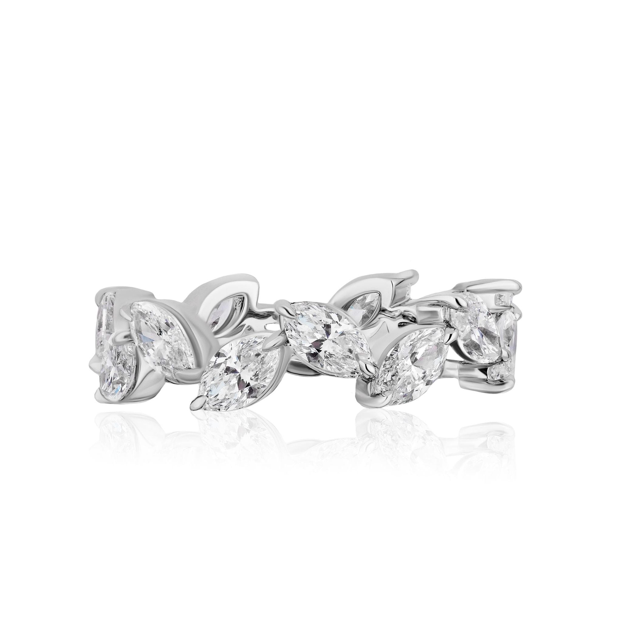 The Alternating Marquise Diamond Eternity Band is crafted in 18K white gold, featuring marquise-cut diamonds in a leaf-inspired pattern with a polished, reflective finish.
