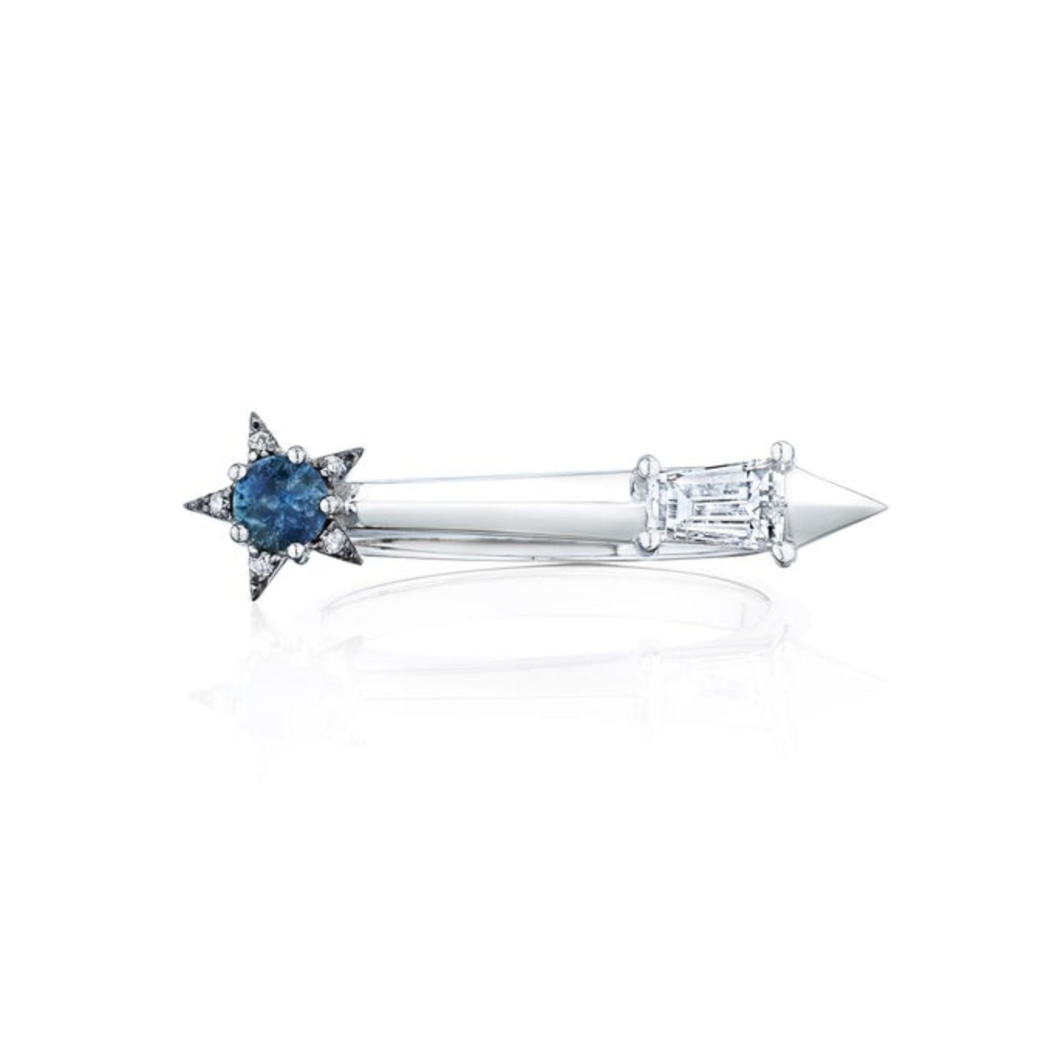 The America250 Star and Baguette Sapphire and Diamond Ring in Platinum features a blue star sapphire on one end and a clear baguette diamond on the other, highlighting handcrafted artistry against a white background.