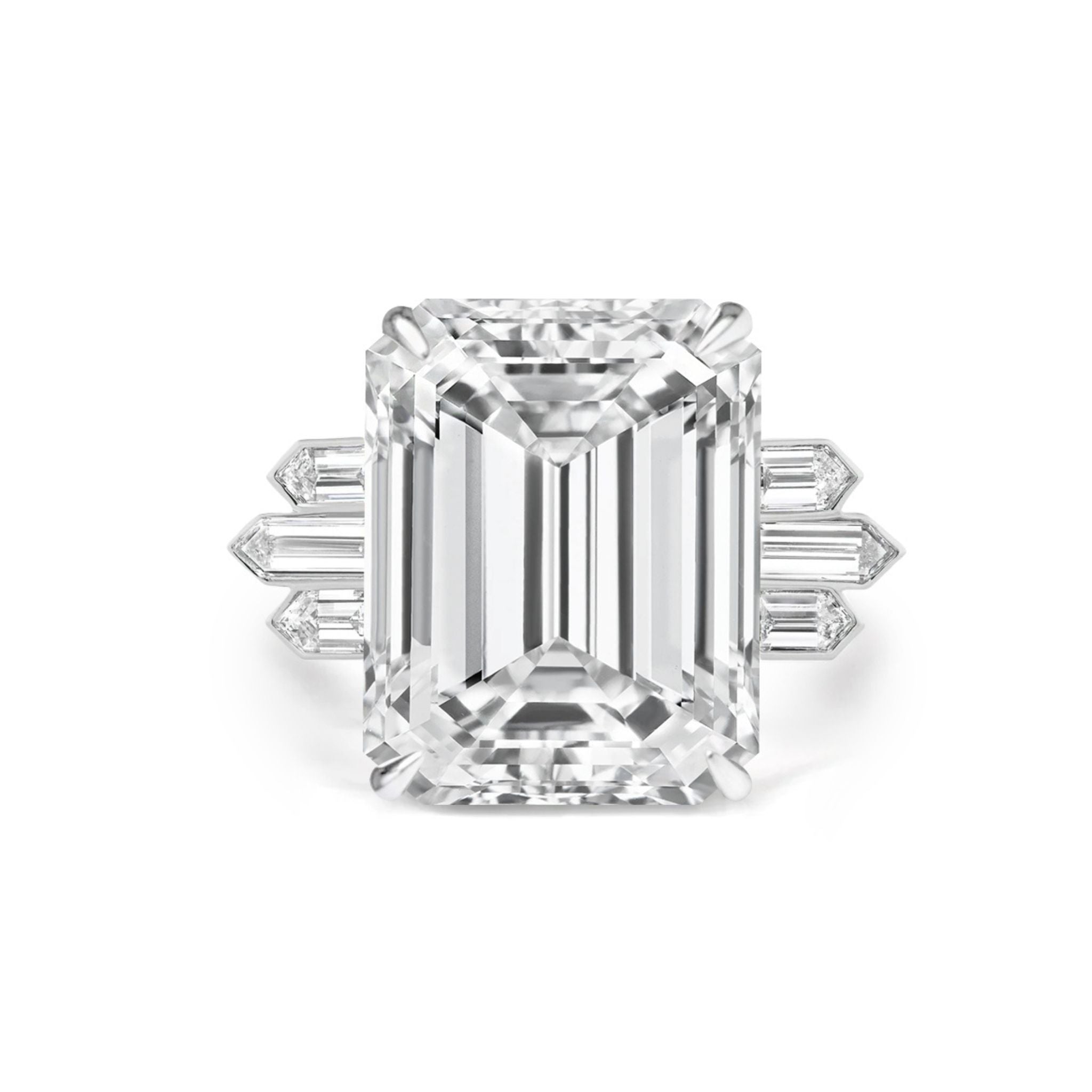 The Art Deco Large Emerald Cut Diamond Engagement Ring features a platinum band and bezel set bullet diamond side stones, capturing timeless elegance with its unique design, displayed against a white background.