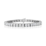 A captivating Tab Set Asscher Cut Diamond Tennis Bracelet in white gold, elegantly showcasing a continuous line of high-clarity VVS-VS Asscher cut diamonds against a pristine white background.
