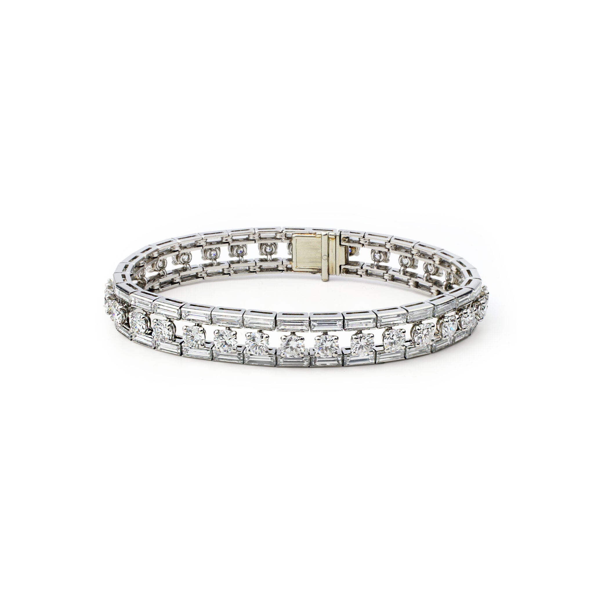 The Cartier Mid-Century Diamond Bracelet features vintage-inspired platinum links, each set with round, clear diamonds and secured with a box clasp. Presented elegantly against a white background.