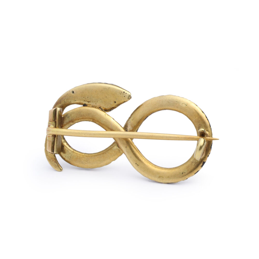 An Antique Diamond and Enamel Snake Pin with a pin fastener is photographed on a plain white background.