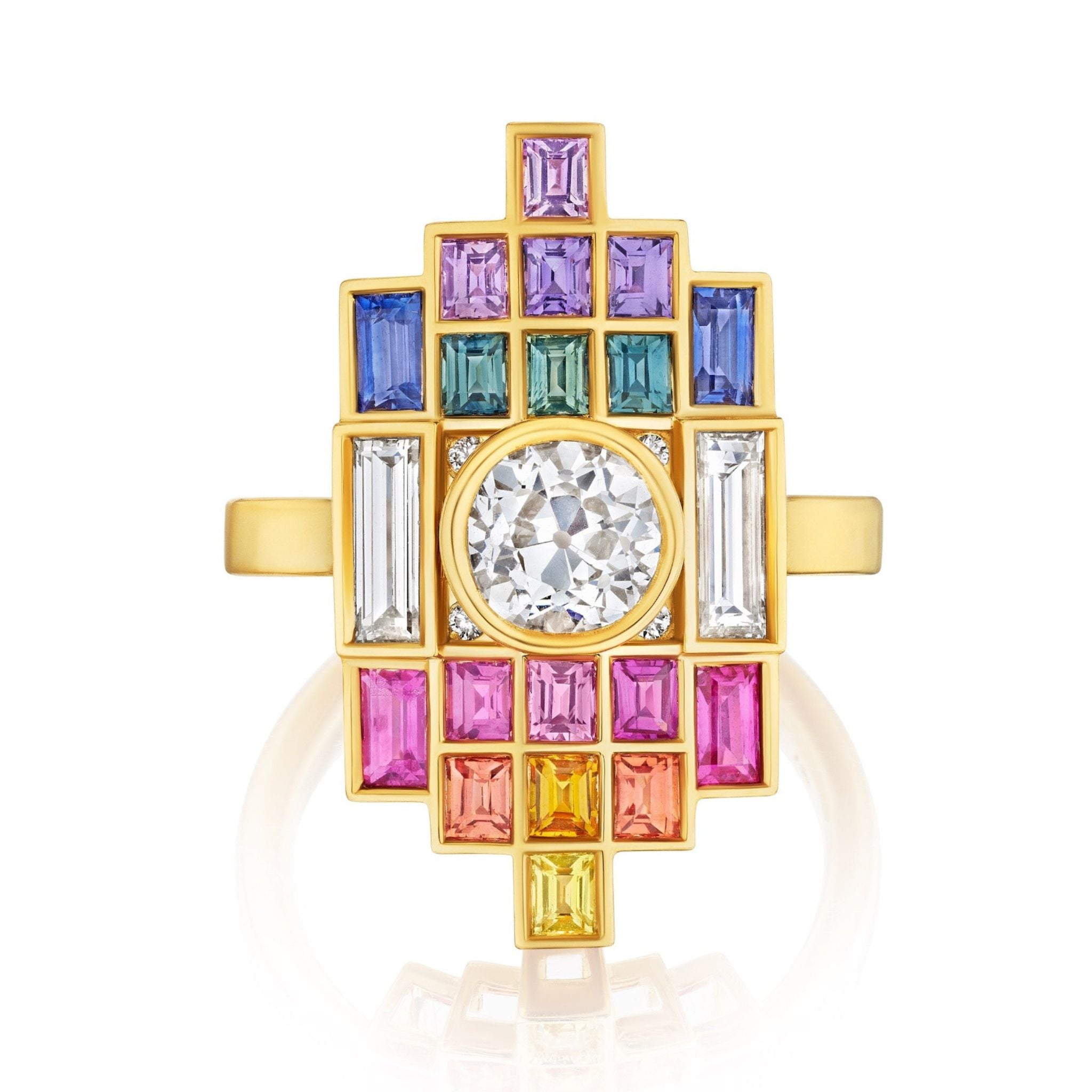The Art Deco Bezel Set Ring in yellow gold features a central diamond, accented by multicolor baguette cut sapphires arranged in a geometric pattern for a vibrant, modern look.