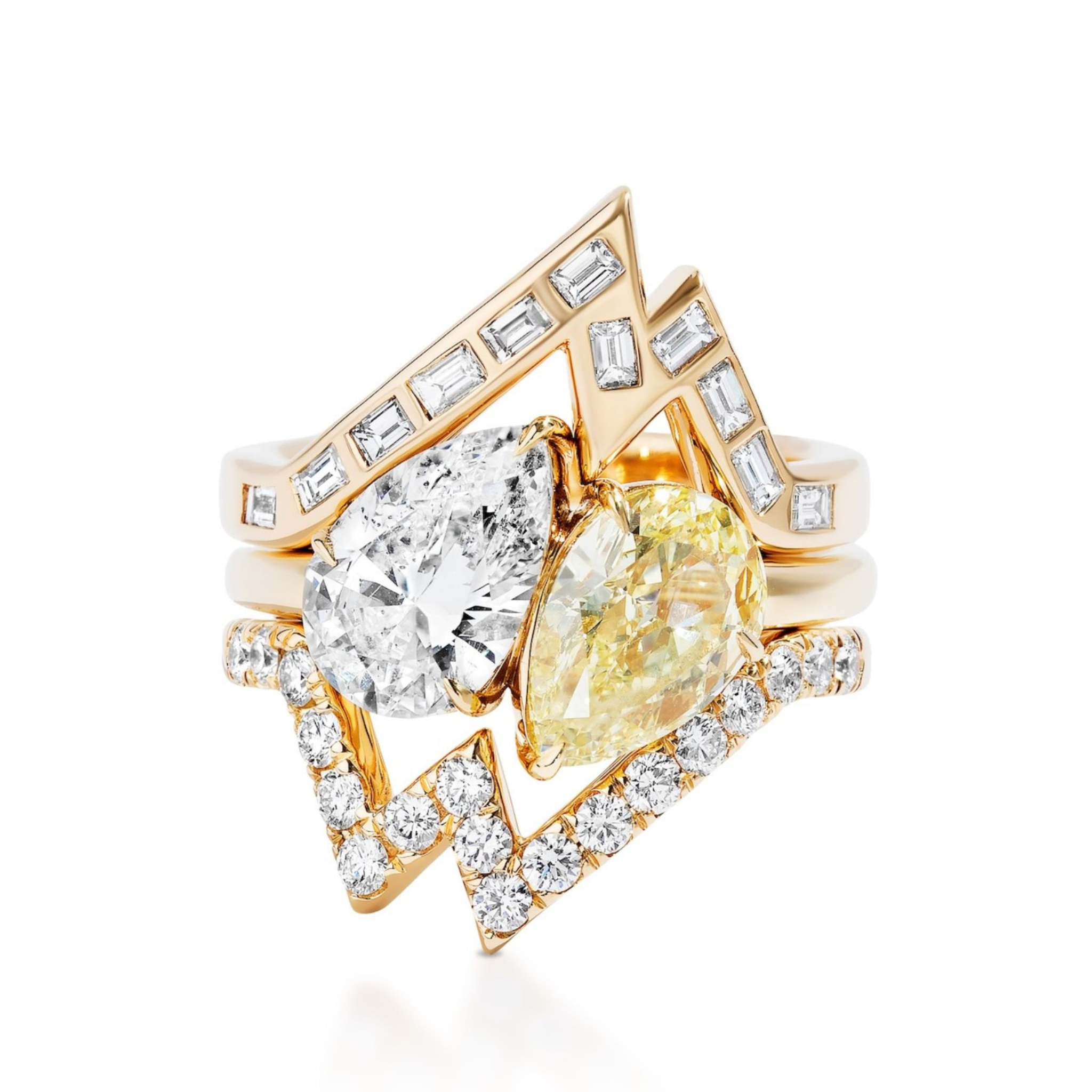 The Baguette and Round Diamond Ring Jacket in Yellow Gold features two large pear-shaped diamonds—one clear, one yellow—framed by round and baguette diamonds in a striking geometric design.