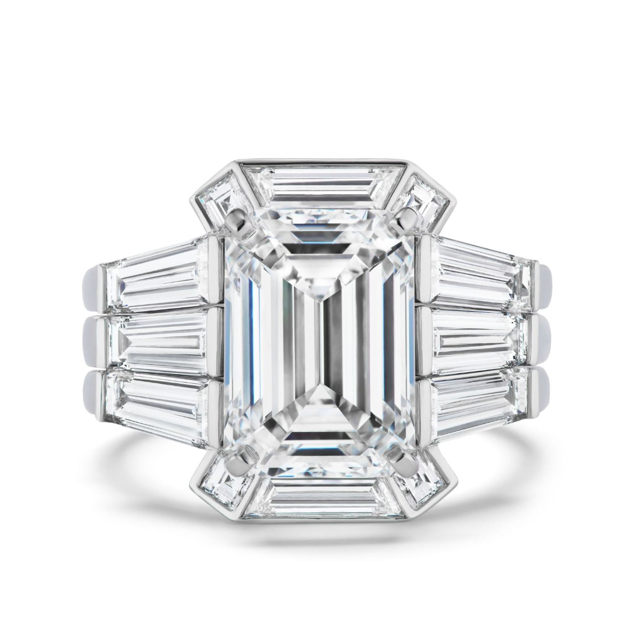 The Geometric Bezel Set Baguette and Asscher Cut Diamond Ring Jacket in White Gold features baguette and asscher cut diamonds in a bold, art deco geometric design that surrounds your central ring.