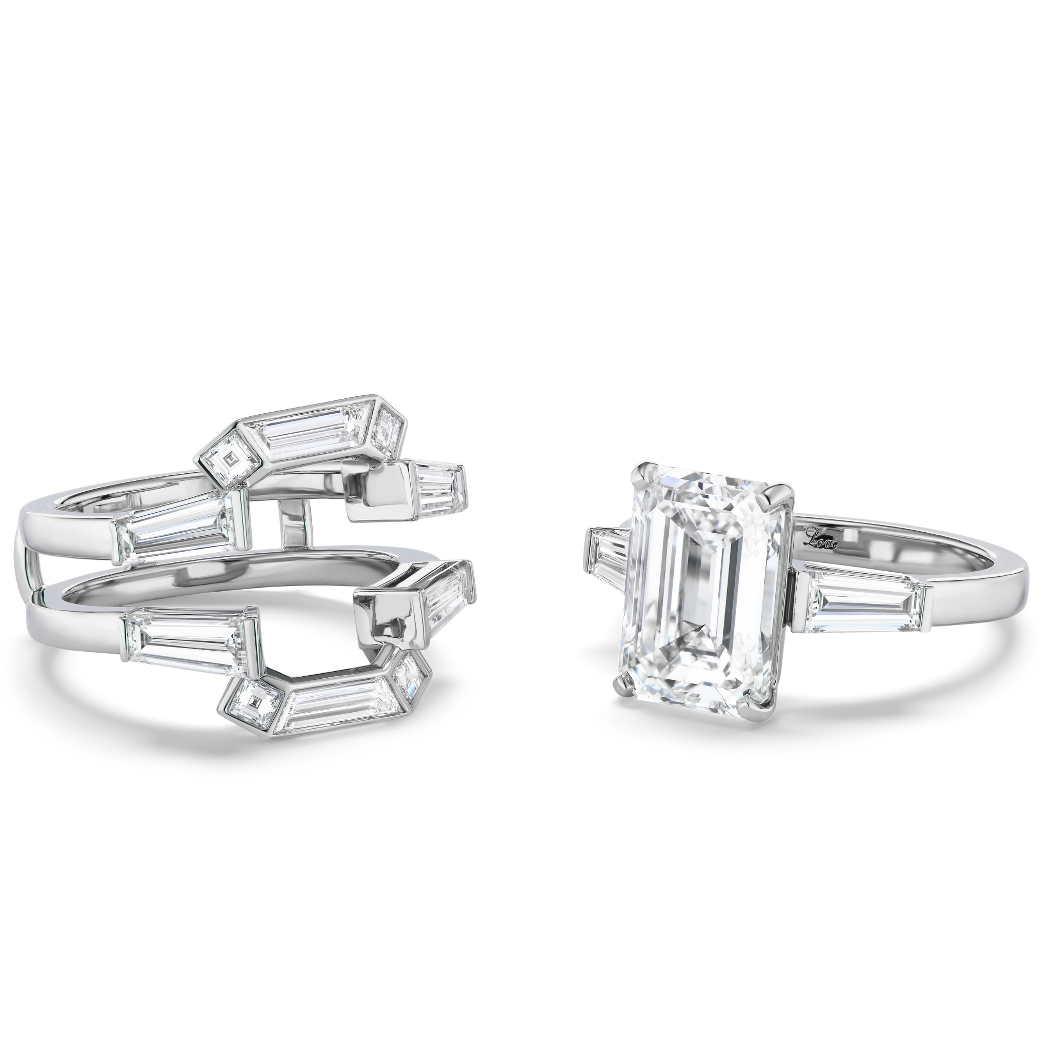 The Geometric Bezel Set Baguette and Asscher Cut Diamond Ring Jacket in white gold is showcased on a white background, featuring striking baguette diamonds, geometric patterns, and an emerald-cut center diamond accent.