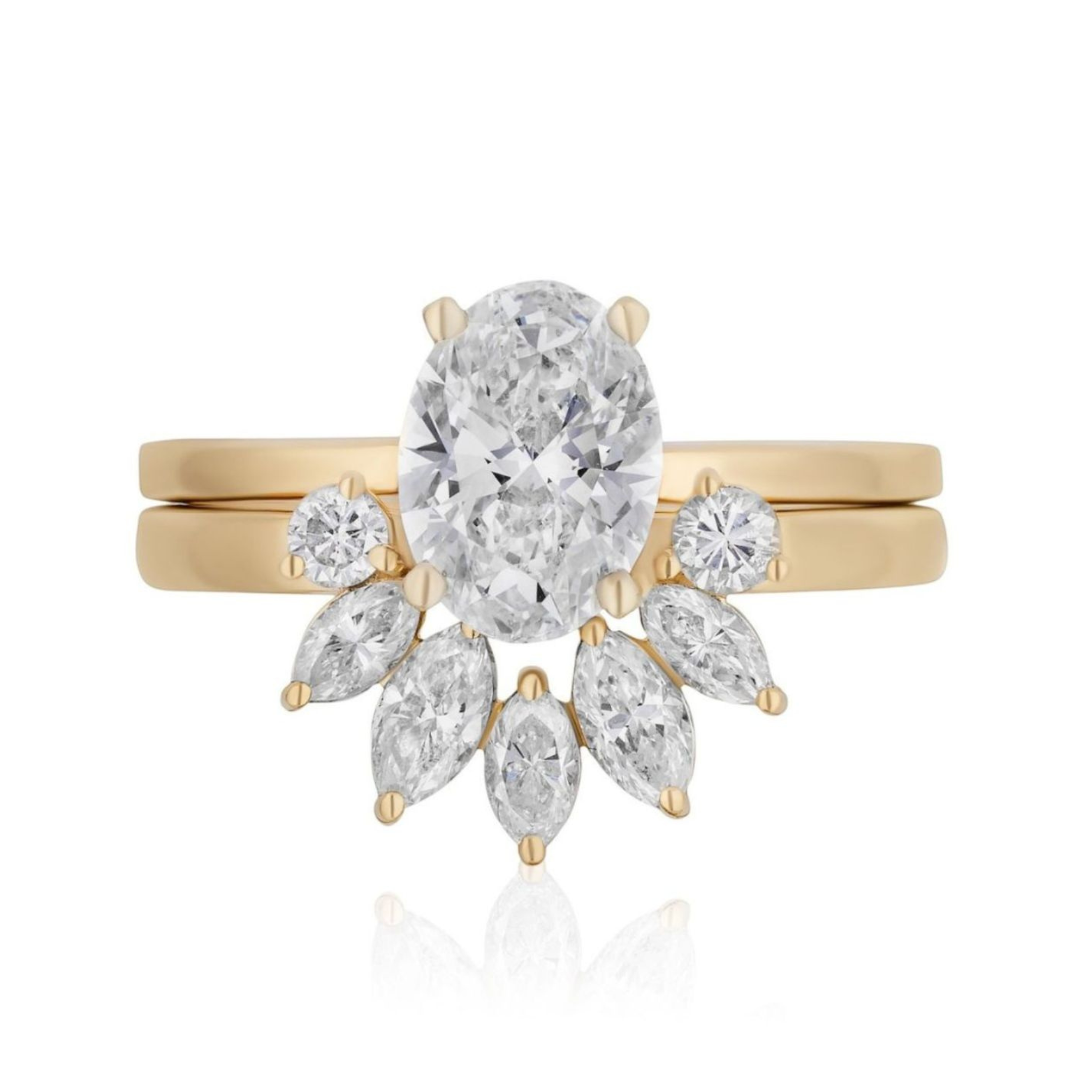 The Marquise and Round Diamond Ring Jacket in Yellow Gold features an oval-cut center diamond with two round and four marquise diamonds in a fan design, paired with a matching plain gold band behind it.
