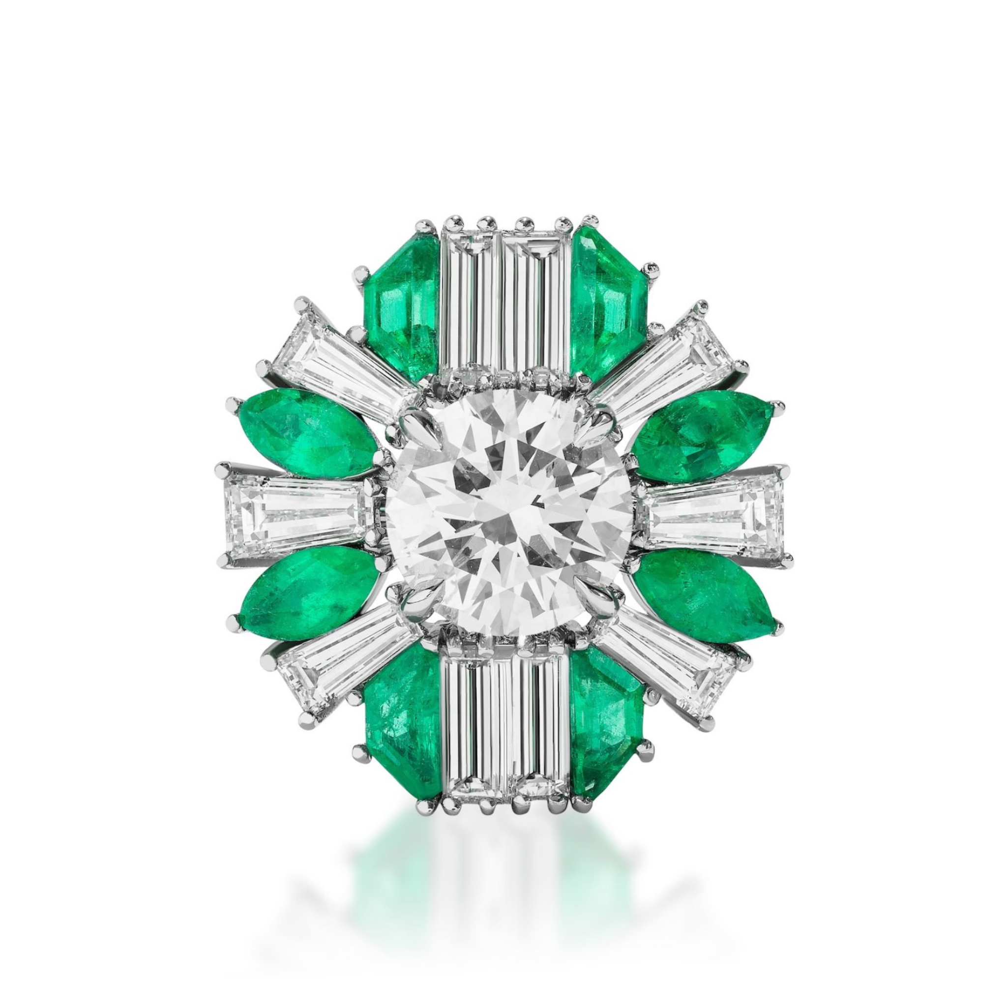 The Mixed Shape Emerald and Diamond Ring Jacket in White Gold features a dazzling round diamond, accented by alternating baguette-cut diamonds and vibrant green emeralds in a floral-inspired, customizable design.