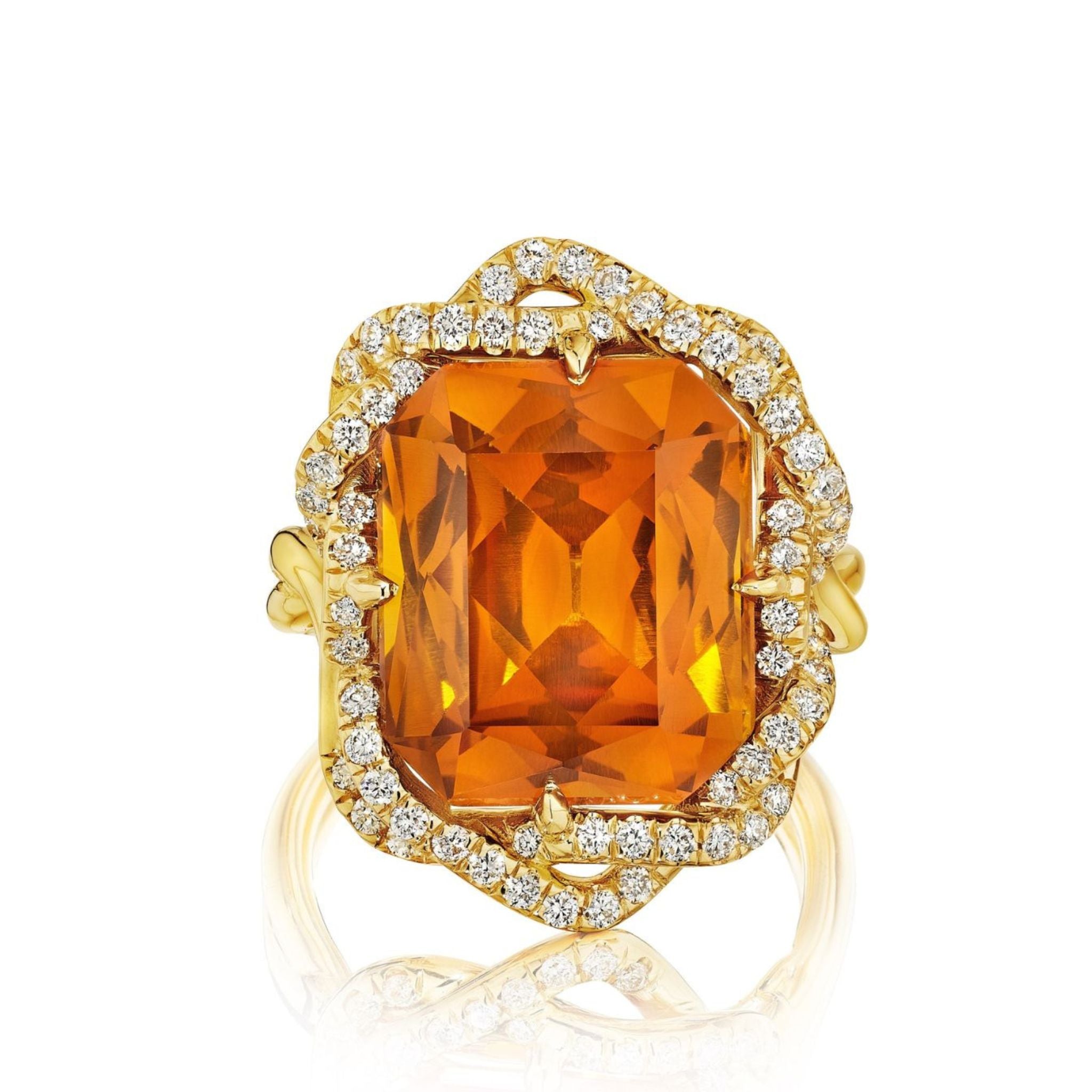 The Bespoke North-South Prong Set Emerald Cut Citrine Cocktail Ring in yellow gold features a twisted double halo of round pavé diamonds, creating an ornate and elegant statement piece.