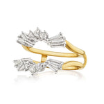 The Round and Tapered Baguette Diamond Ring Jacket in yellow gold features an open band with clusters of round and tapered baguette white diamonds set at each end.