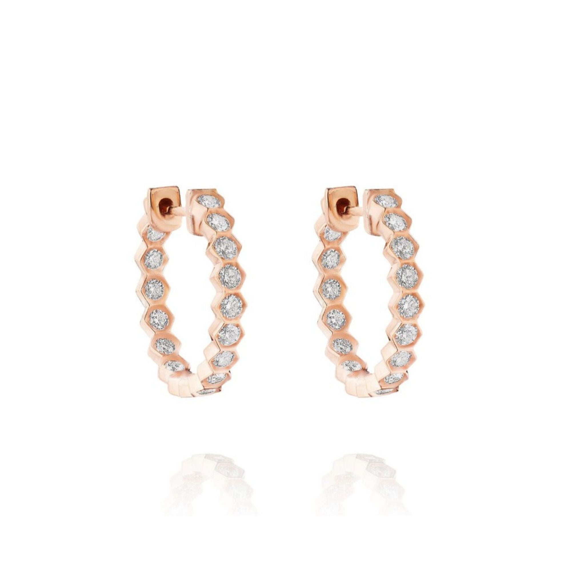 Bezel Set Hexagon Huggies with Round Brilliant Diamonds in rose gold, each segment adorned with a round white diamond, shown on a white background.