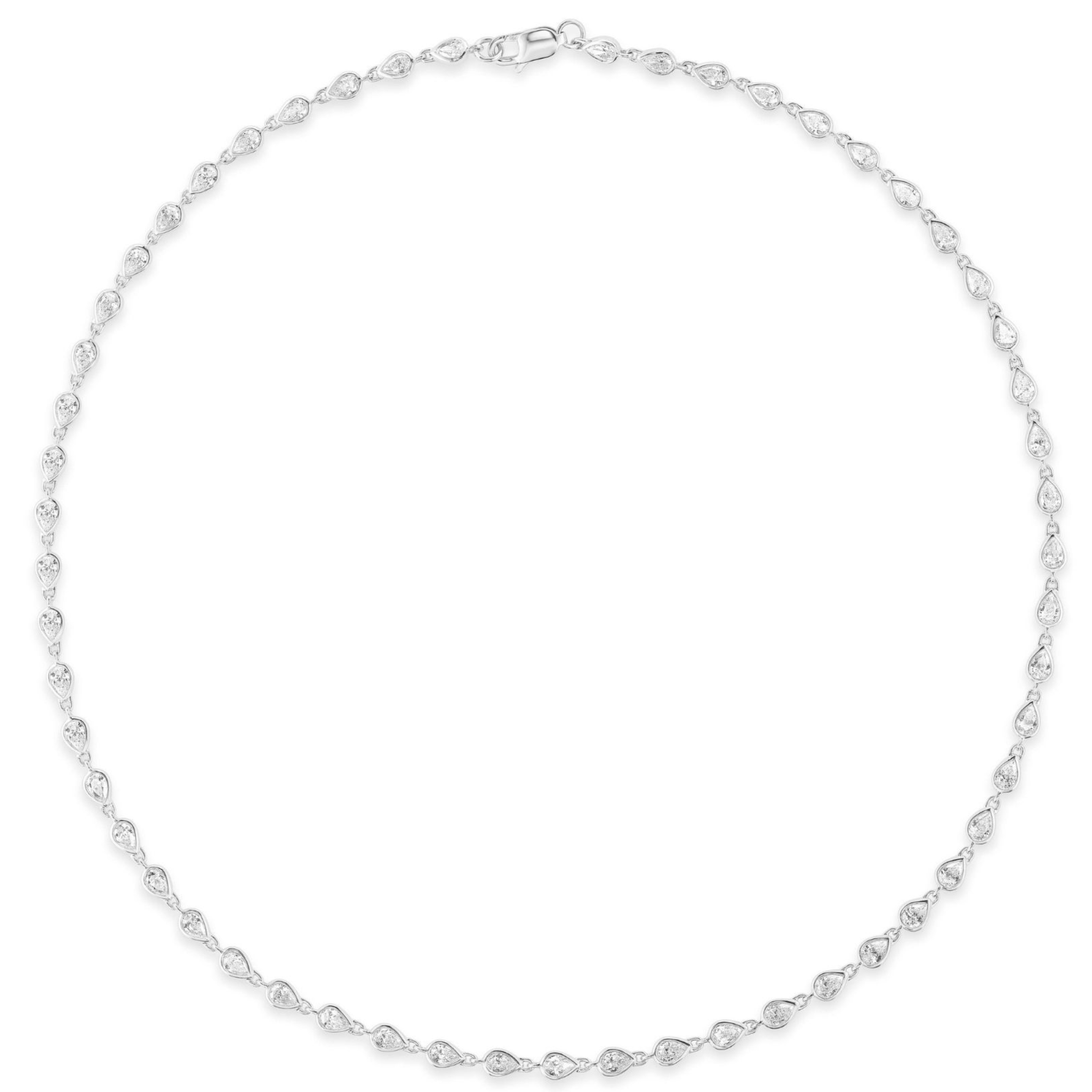 The Bezel Set Pear Shape Diamond Garland Necklace features small, evenly spaced pear-shaped diamonds set in a thin 18K gold chain with a simple clasp.