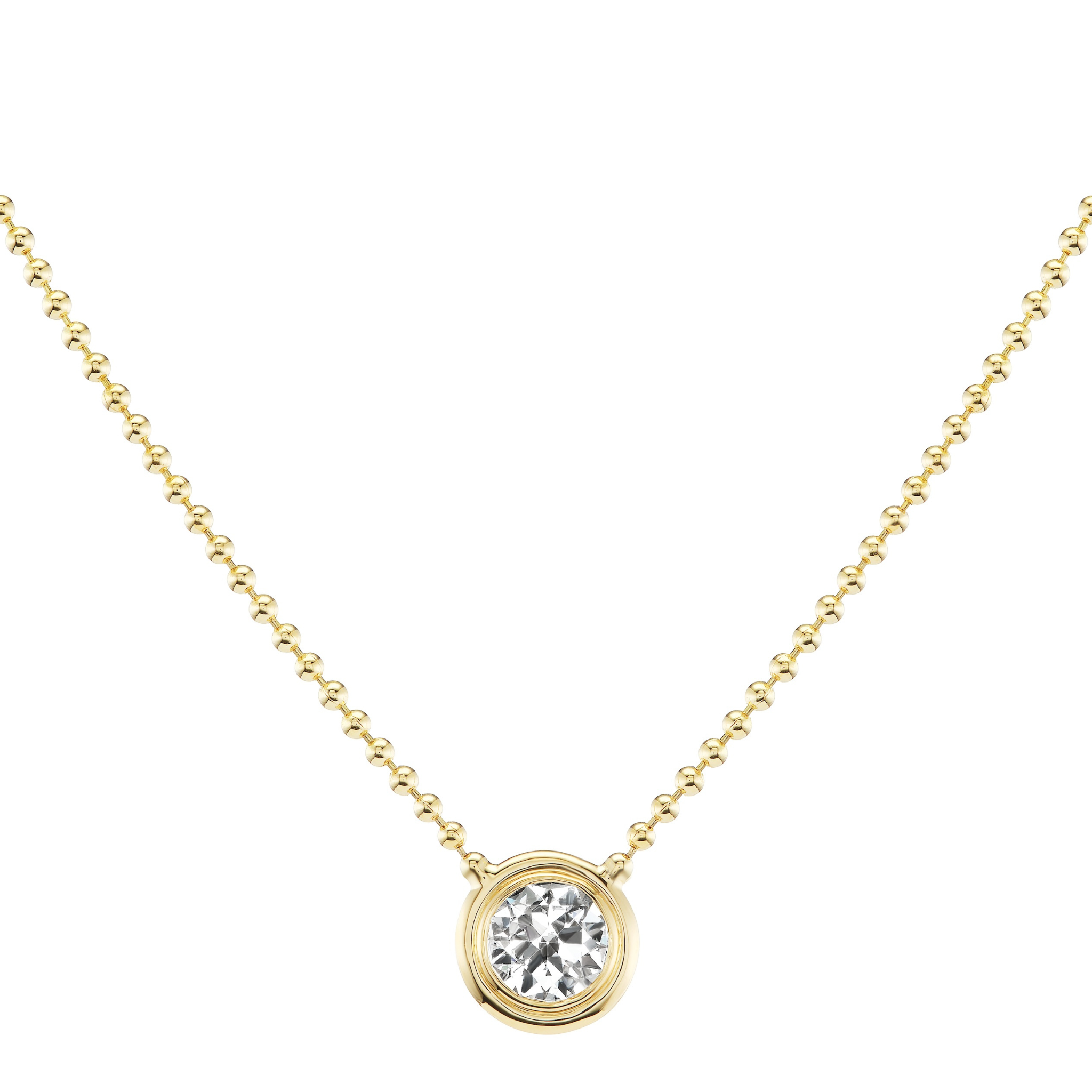 The Bezel Set Round Diamond Ball Chain Necklace in Yellow Gold features a delicate chain with a single round diamond set in a simple gold bezel pendant at the center.