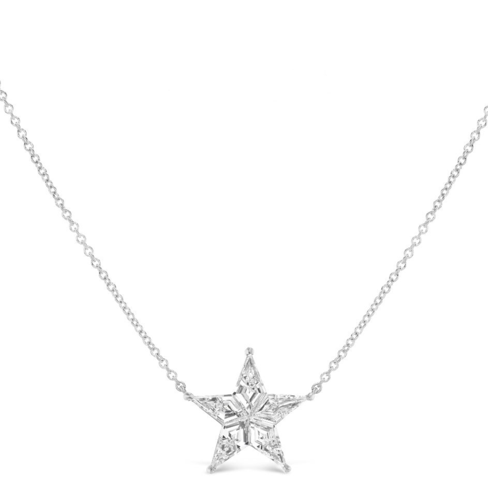 The Celestial Star Diamond Pendant is a delicate silver chain necklace with a multifaceted, star-shaped pendant that sparkles like a diamond, shown centered on a plain white background.
